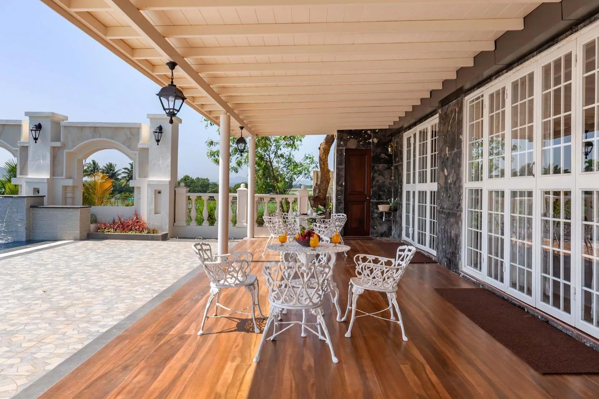Seating area in StayVista's Lake La Vie - Tranquil Lake-View Villa Amidst Farmland with Pool and Poolside Gazebo - Proximity to Sula