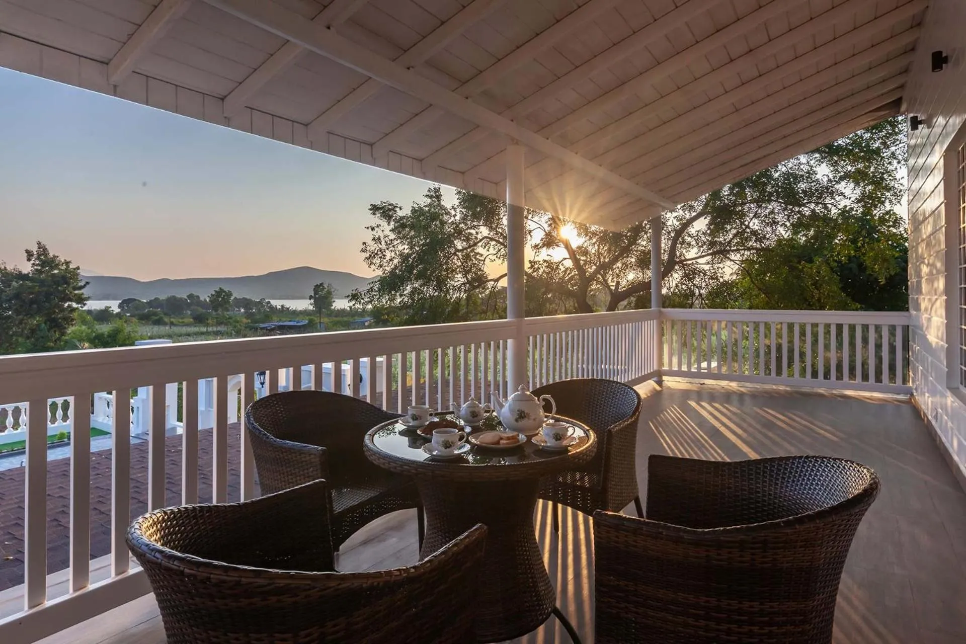 Seating area in StayVista's Lake La Vie - Tranquil Lake-View Villa Amidst Farmland with Pool and Poolside Gazebo - Proximity to Sula
