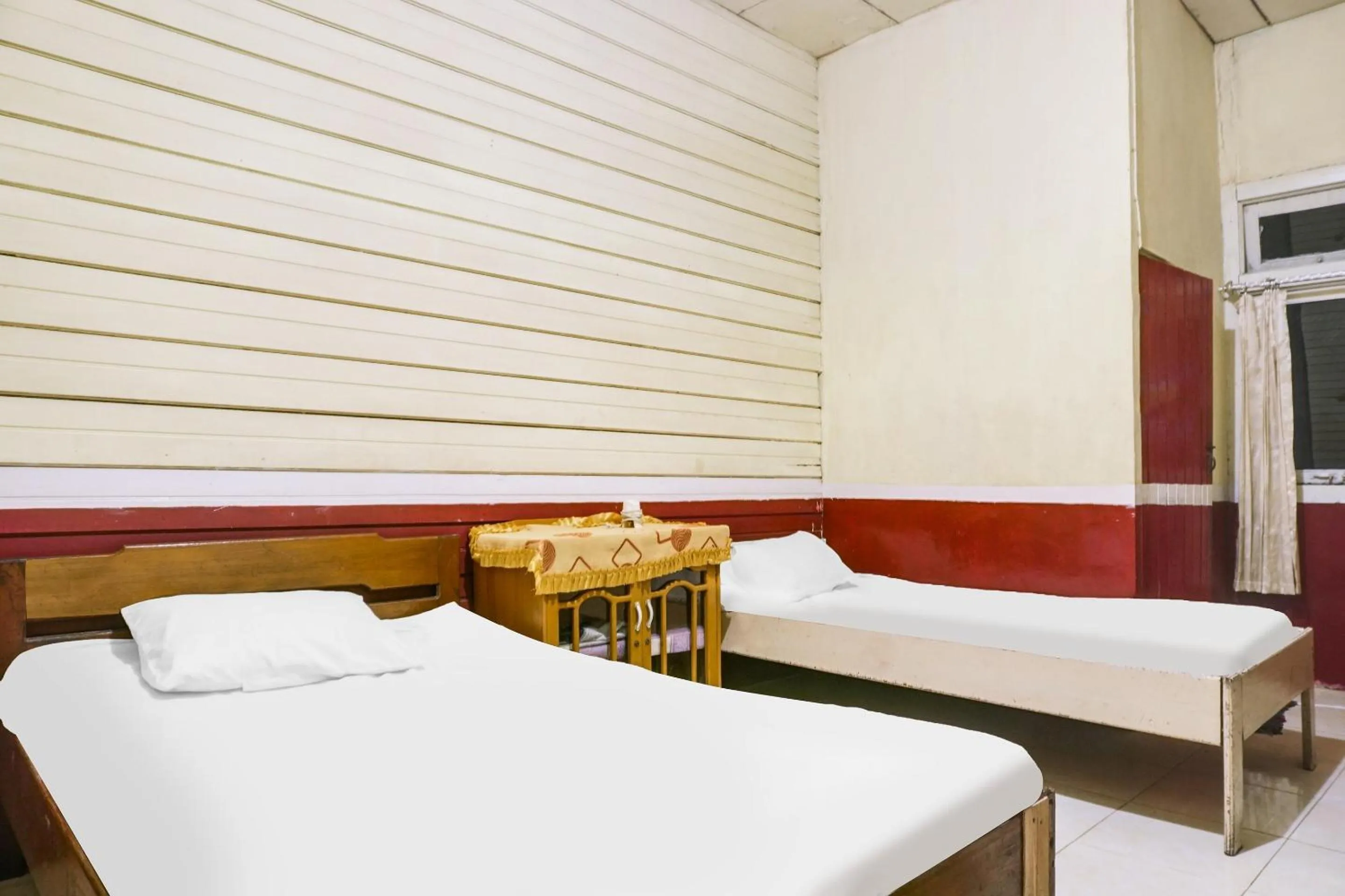 Bedroom in Hotel O Anggrek Daqu Syariah Kapuas