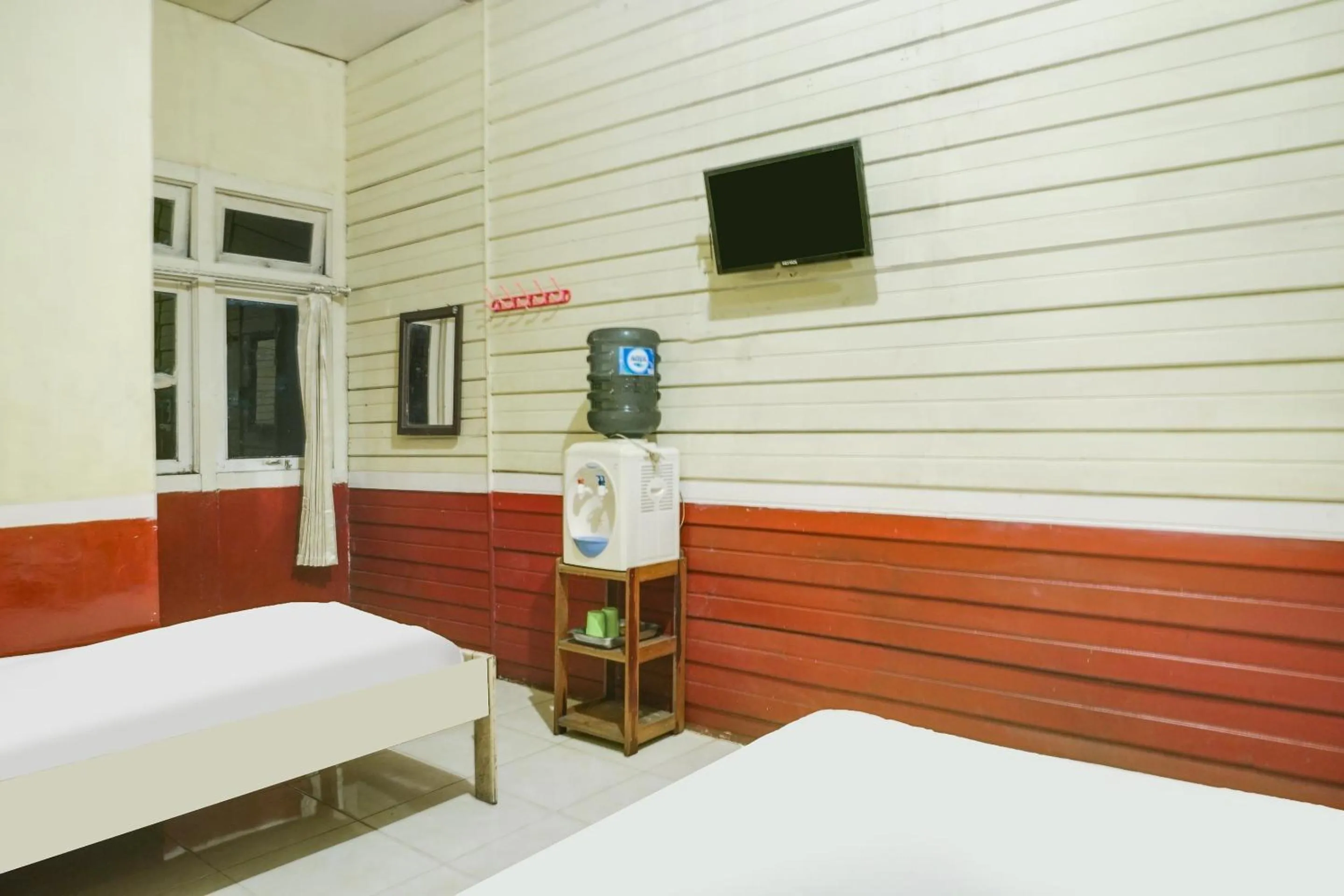 Bedroom in Hotel O Anggrek Daqu Syariah Kapuas