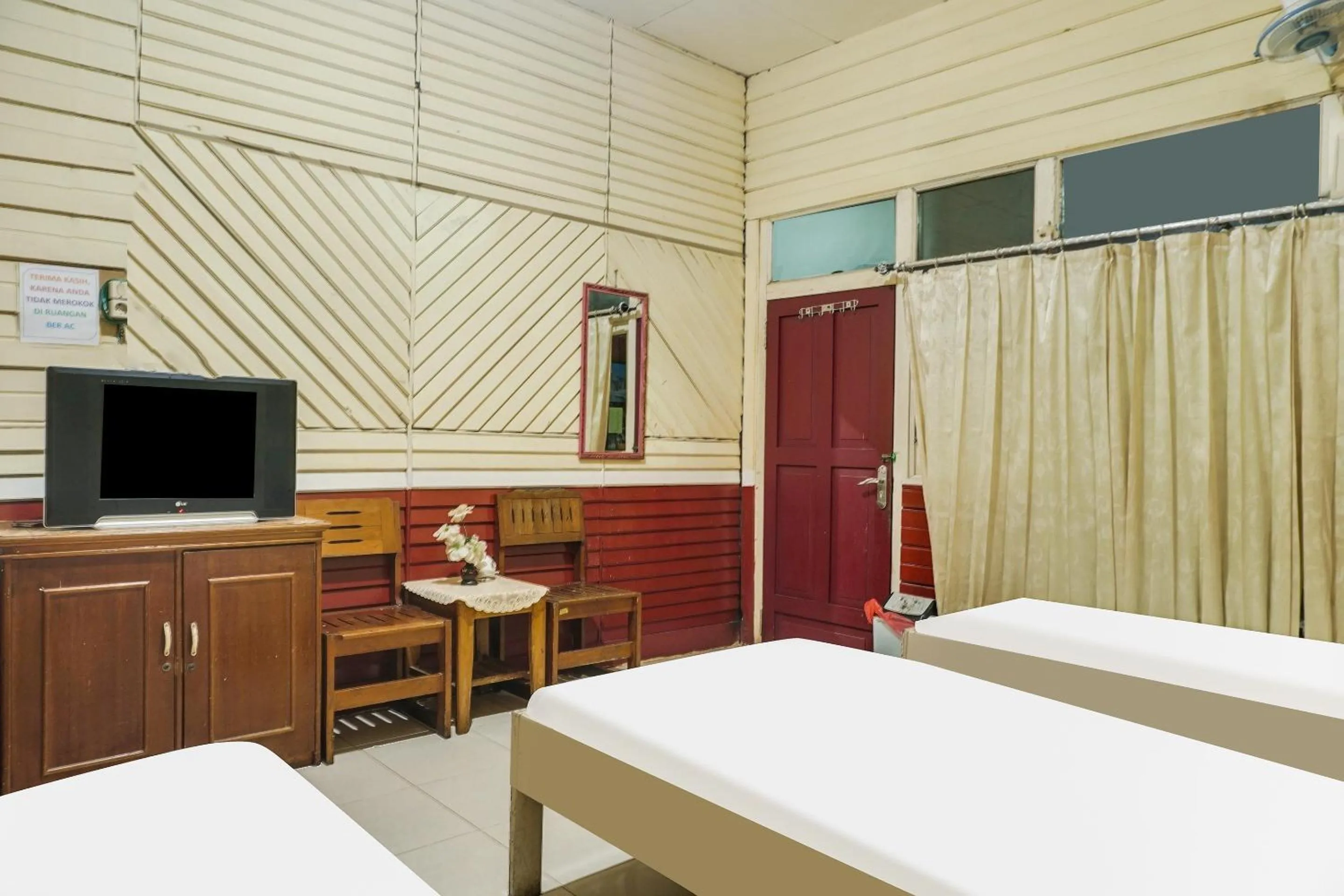 Bedroom in Hotel O Anggrek Daqu Syariah Kapuas