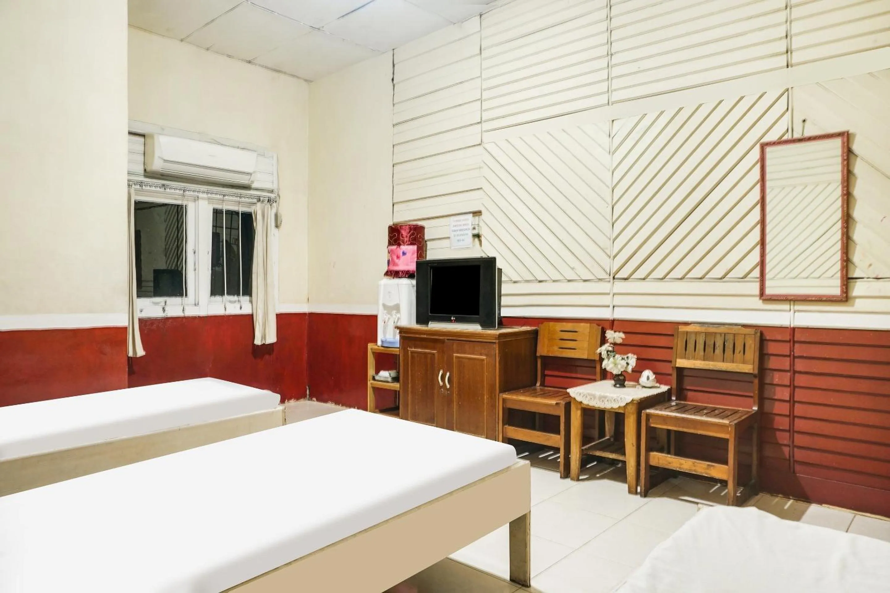Bedroom in Hotel O Anggrek Daqu Syariah Kapuas