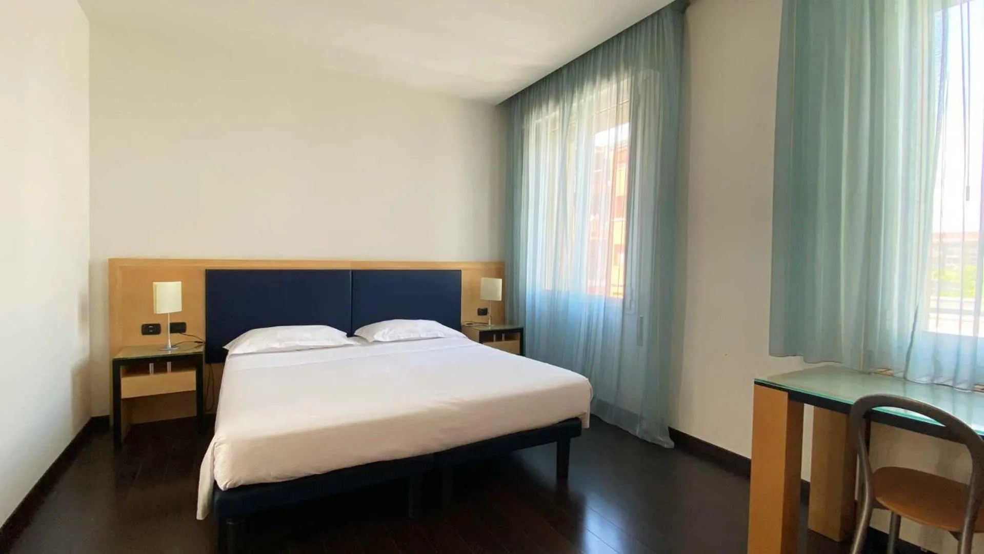 Bed in Luxury Rooms Padova Station