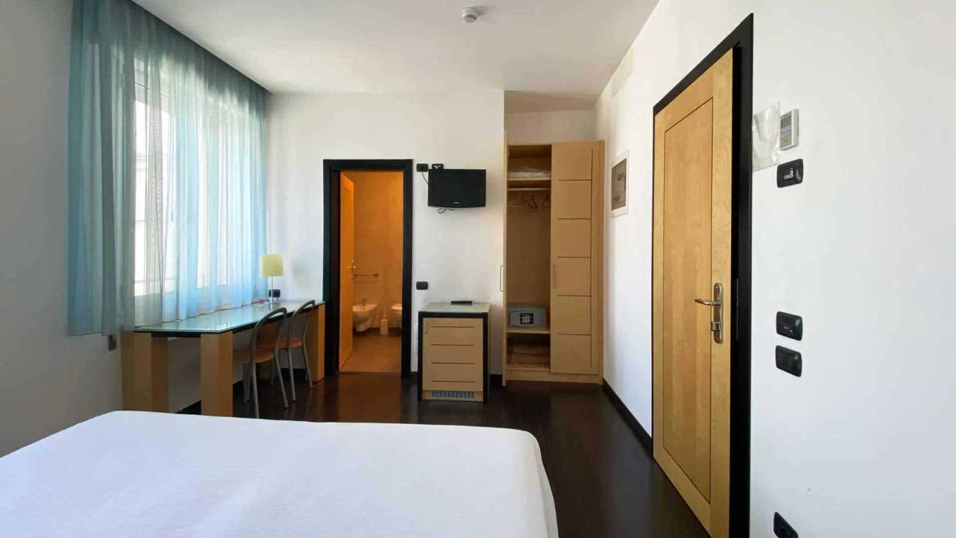 Bed in Luxury Rooms Padova Station