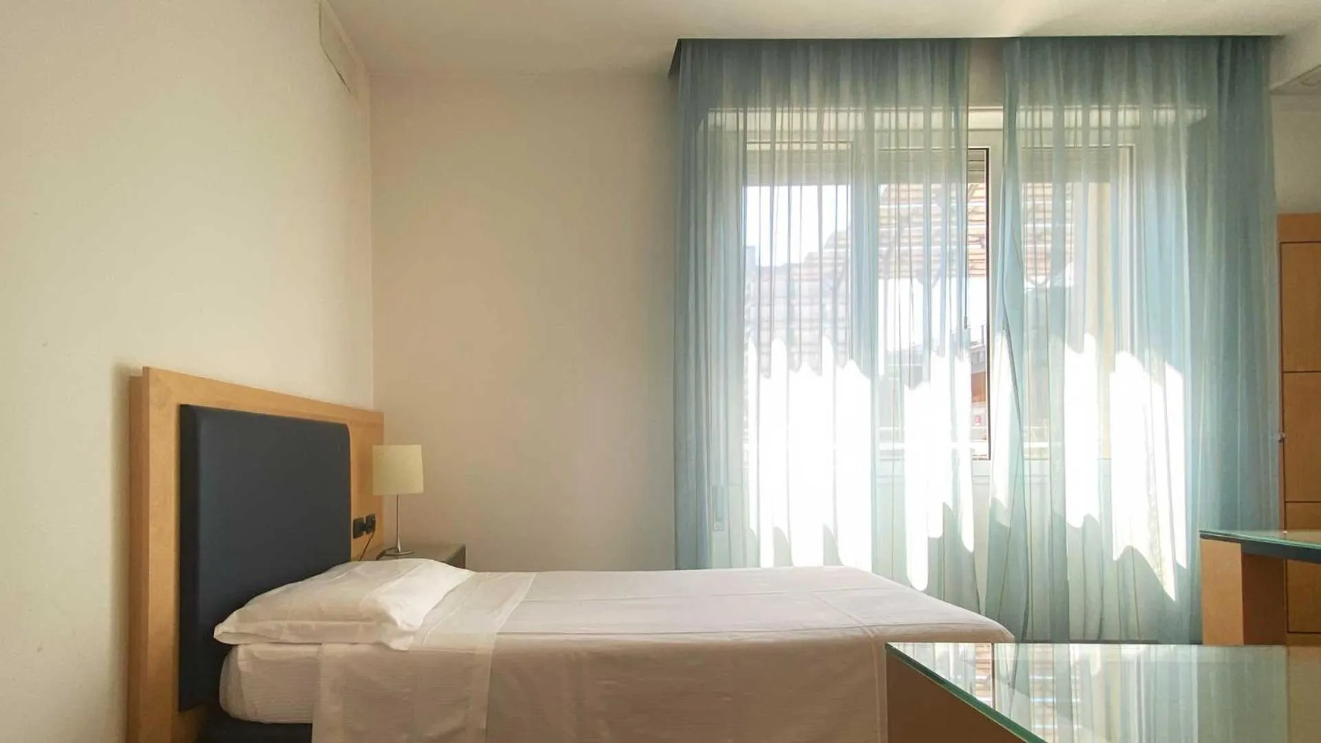 Bed in Luxury Rooms Padova Station