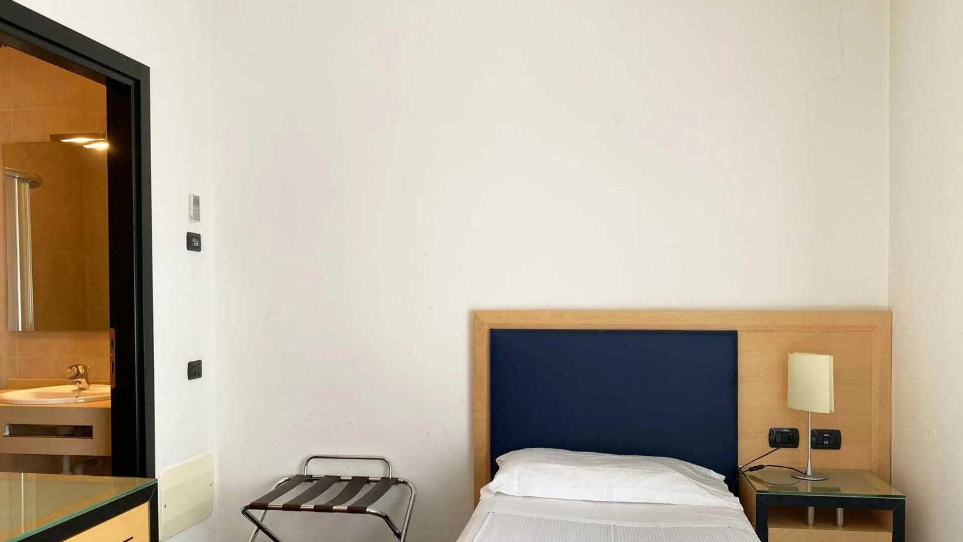 Bed in Luxury Rooms Padova Station