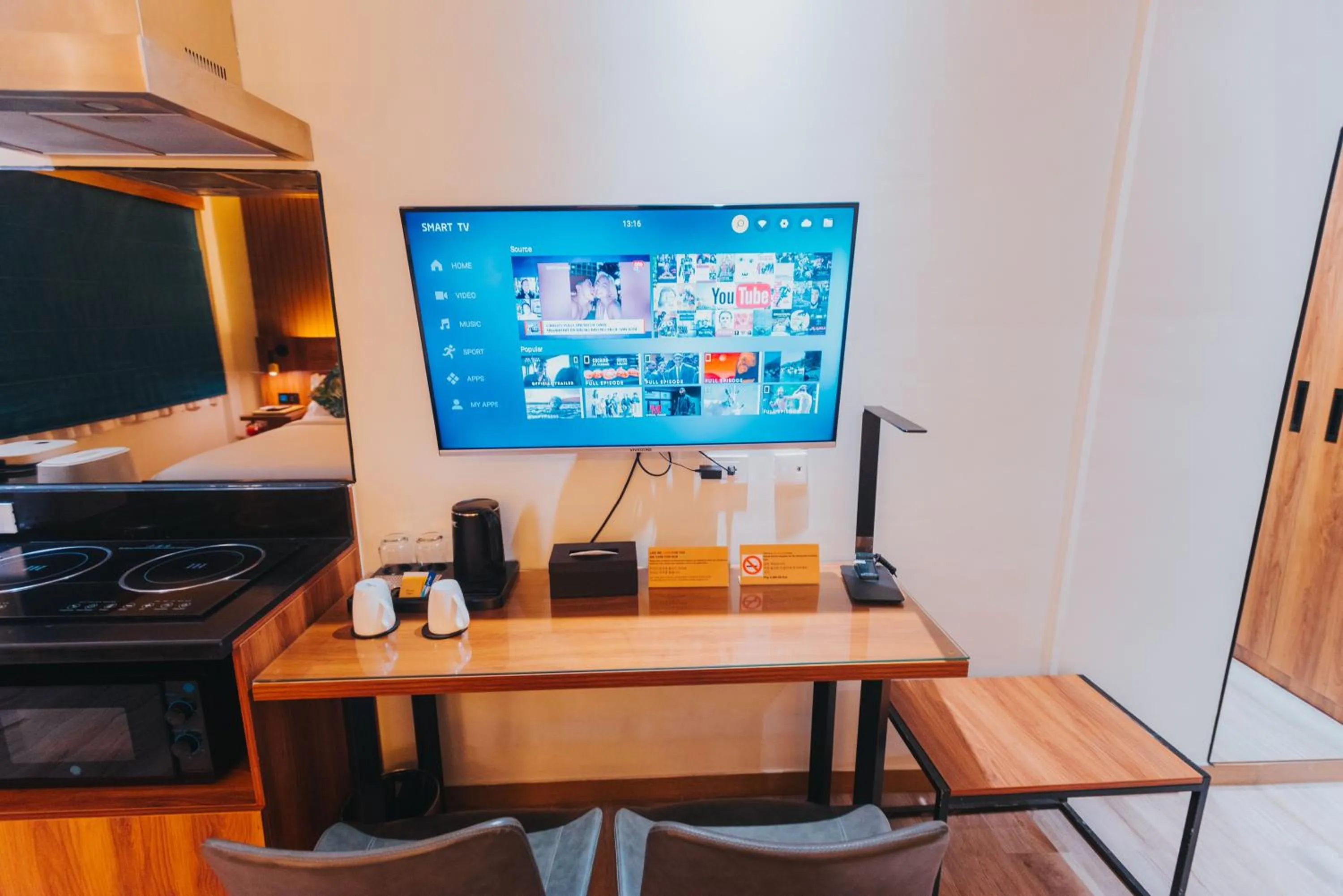 TV and multimedia in SureStay Studio by Best Western Clarkview Angeles City