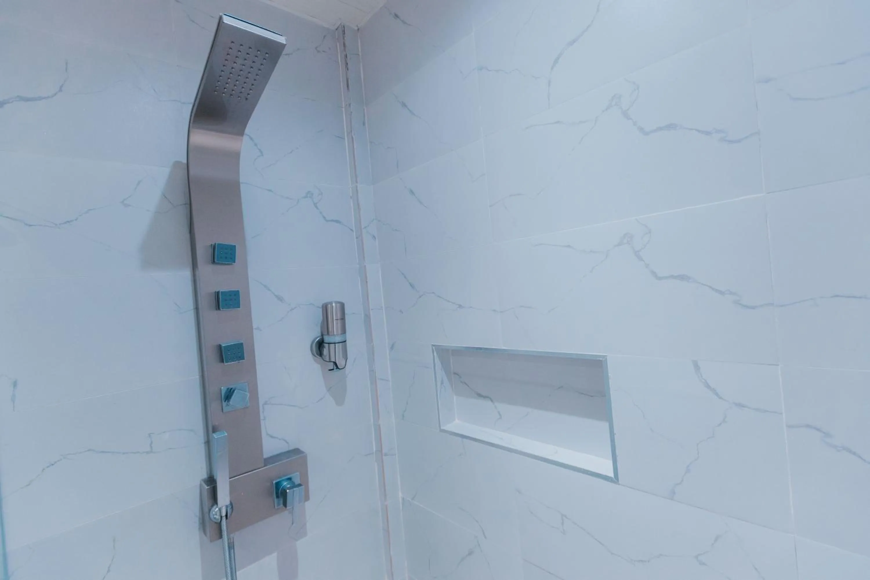 Bathroom in SureStay Studio by Best Western Clarkview Angeles City