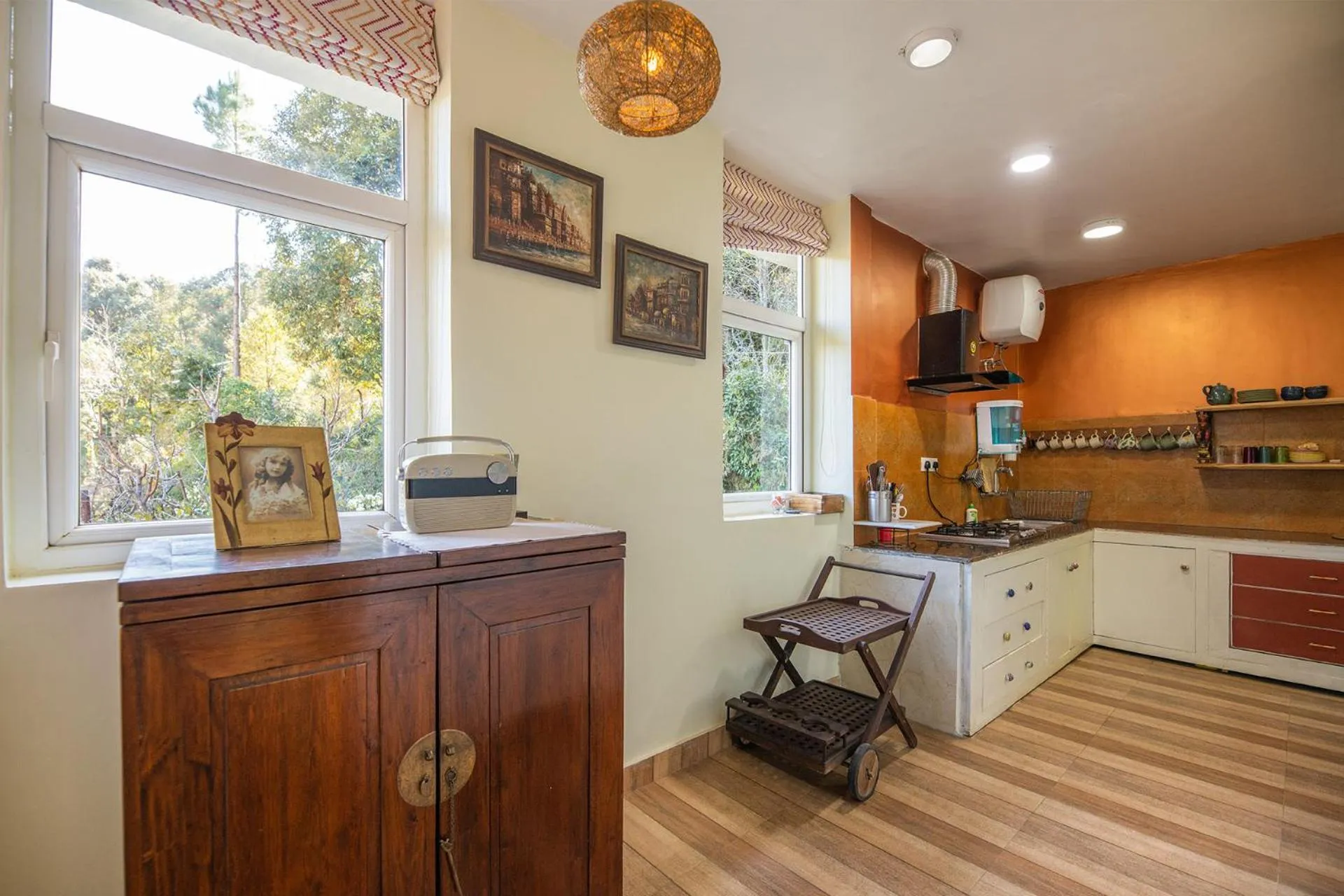 Kitchen or kitchenette in Hollyhock Cottage by VEO - Part of StayVista