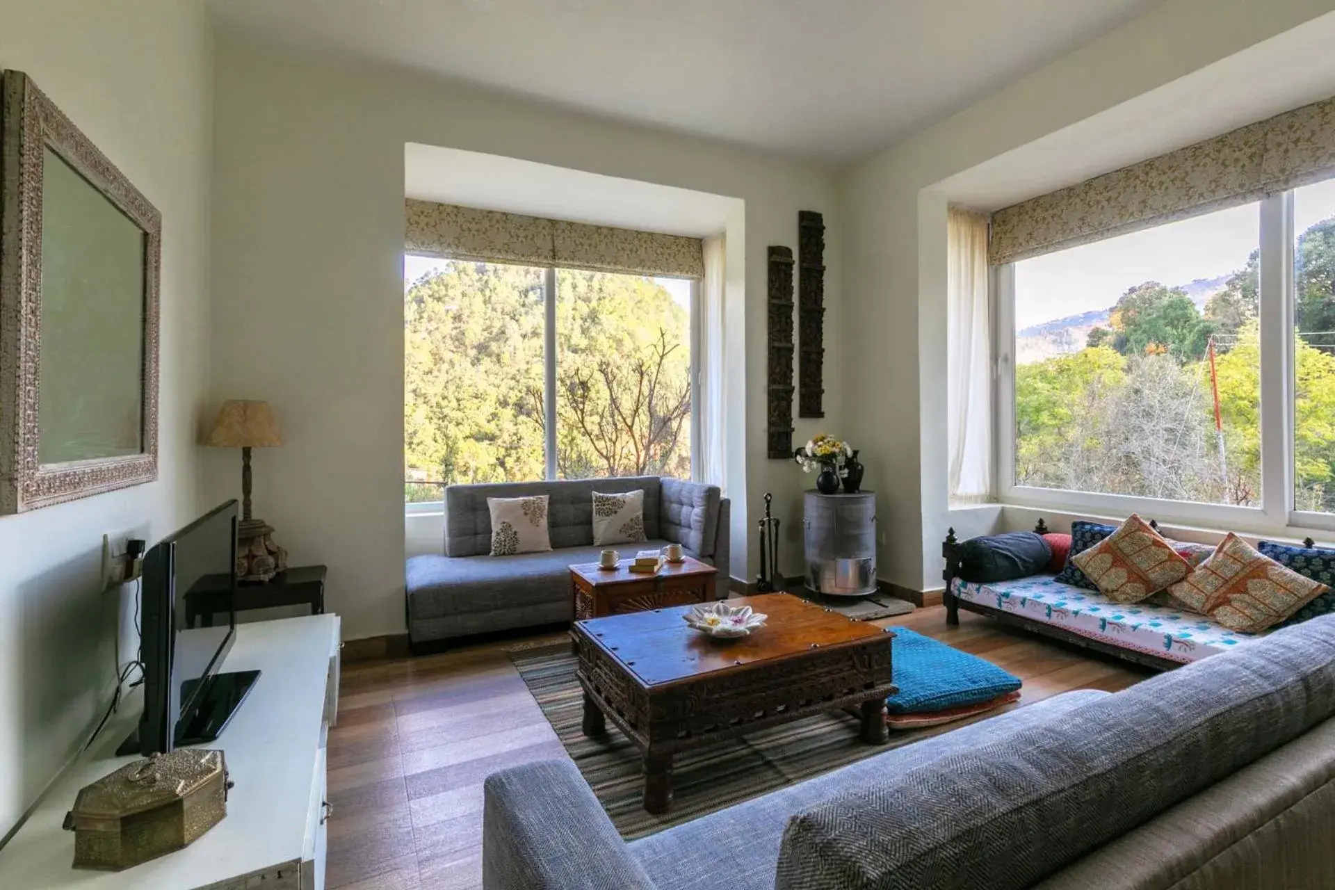 Living room in Hollyhock Cottage by VEO - Part of StayVista Living room in Hollyhock Cottage by VEO - Part of StayVista