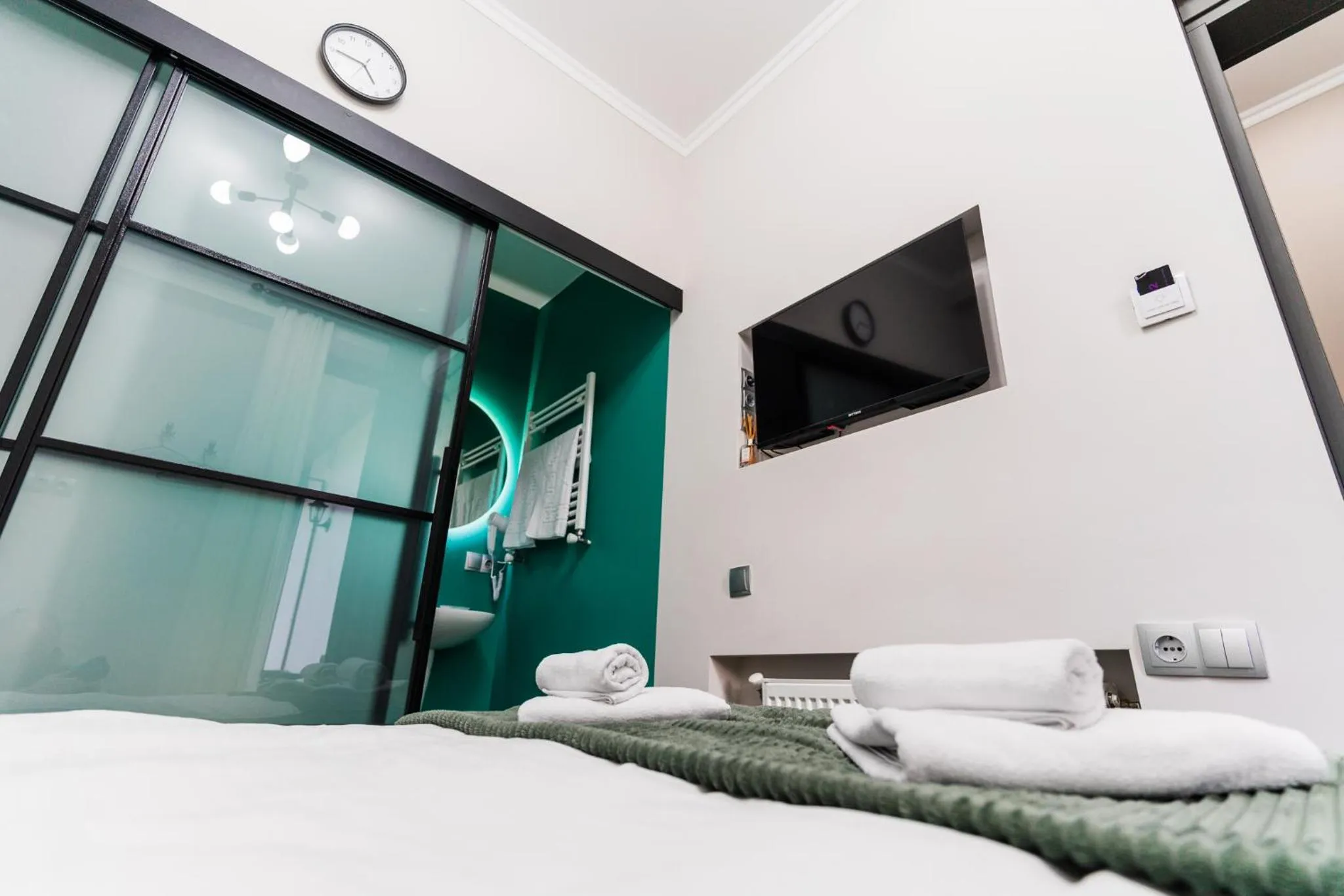 Toilet, Bed in Trinity Hotel