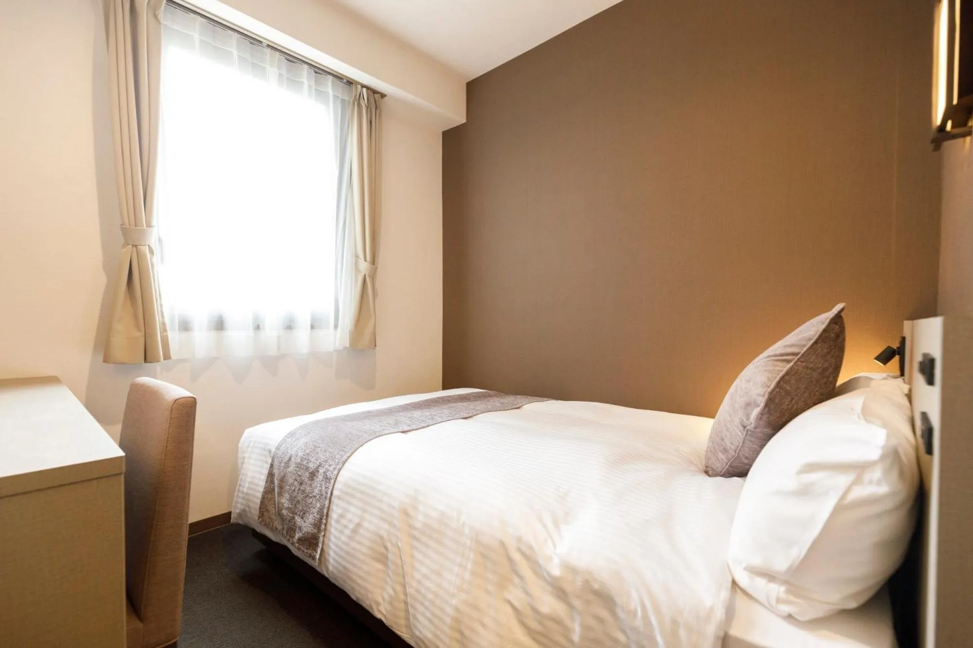 Bed in HOTEL Third Place Hakata