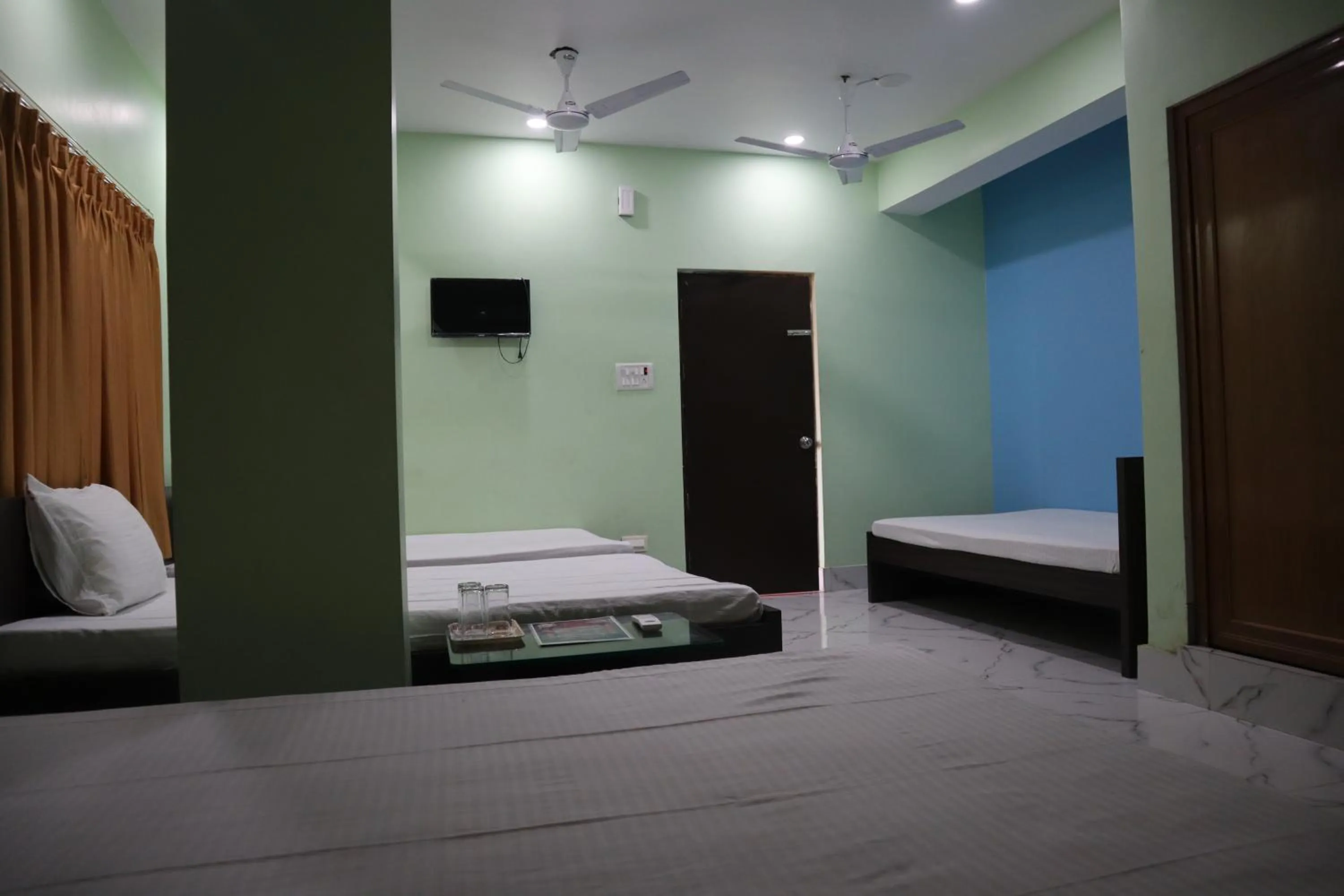 Bed in Hotel Saan Berhampore