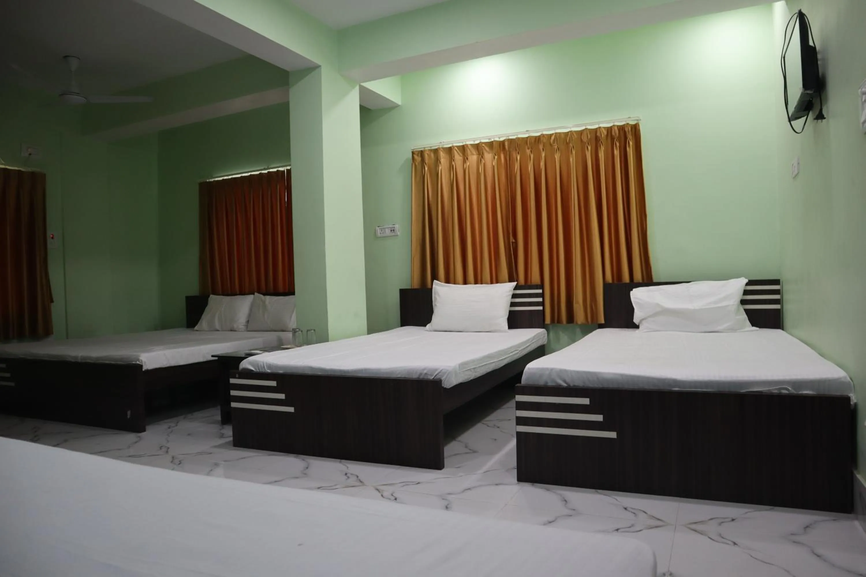 Bed in Hotel Saan Berhampore