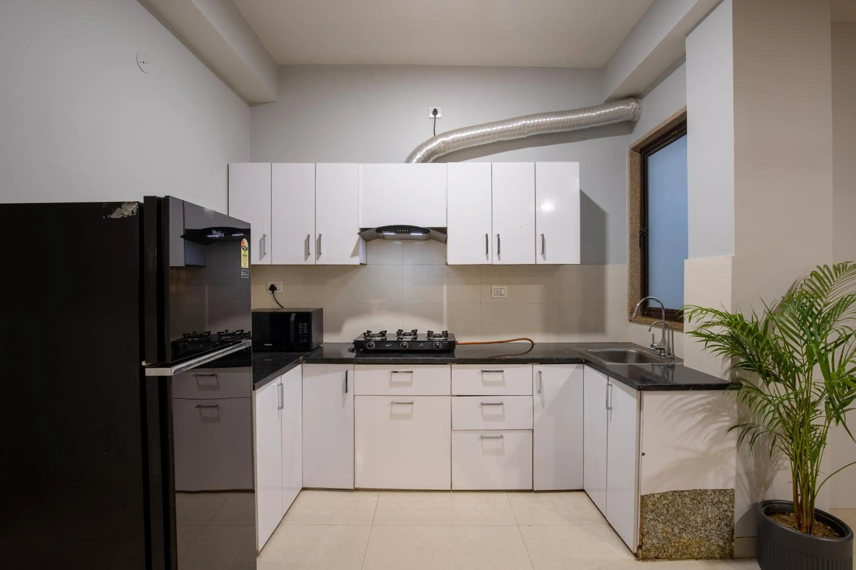 Kitchen or kitchenette in BedChambers Serviced Apartment, Medicity