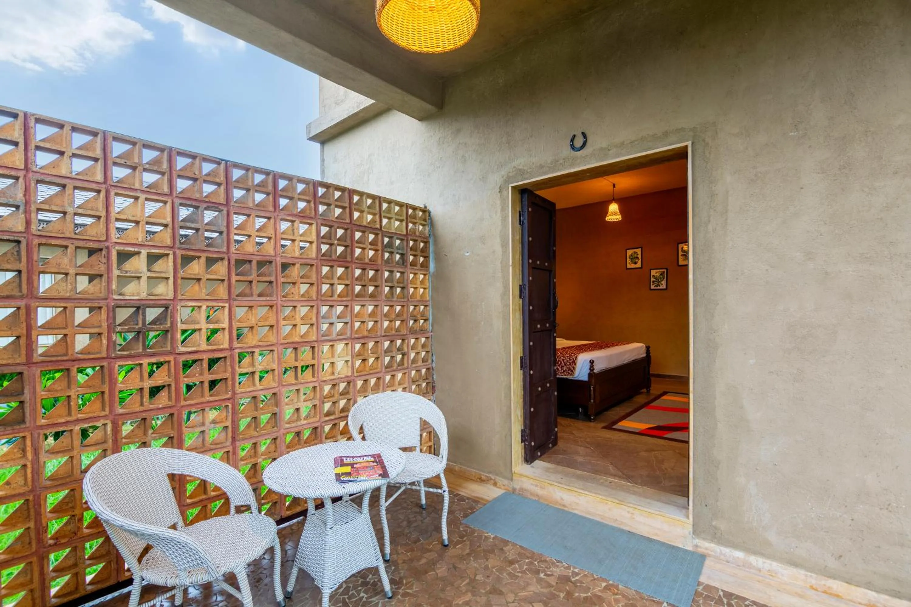 Seating area, Bed in Sterling Orient Woods Pench