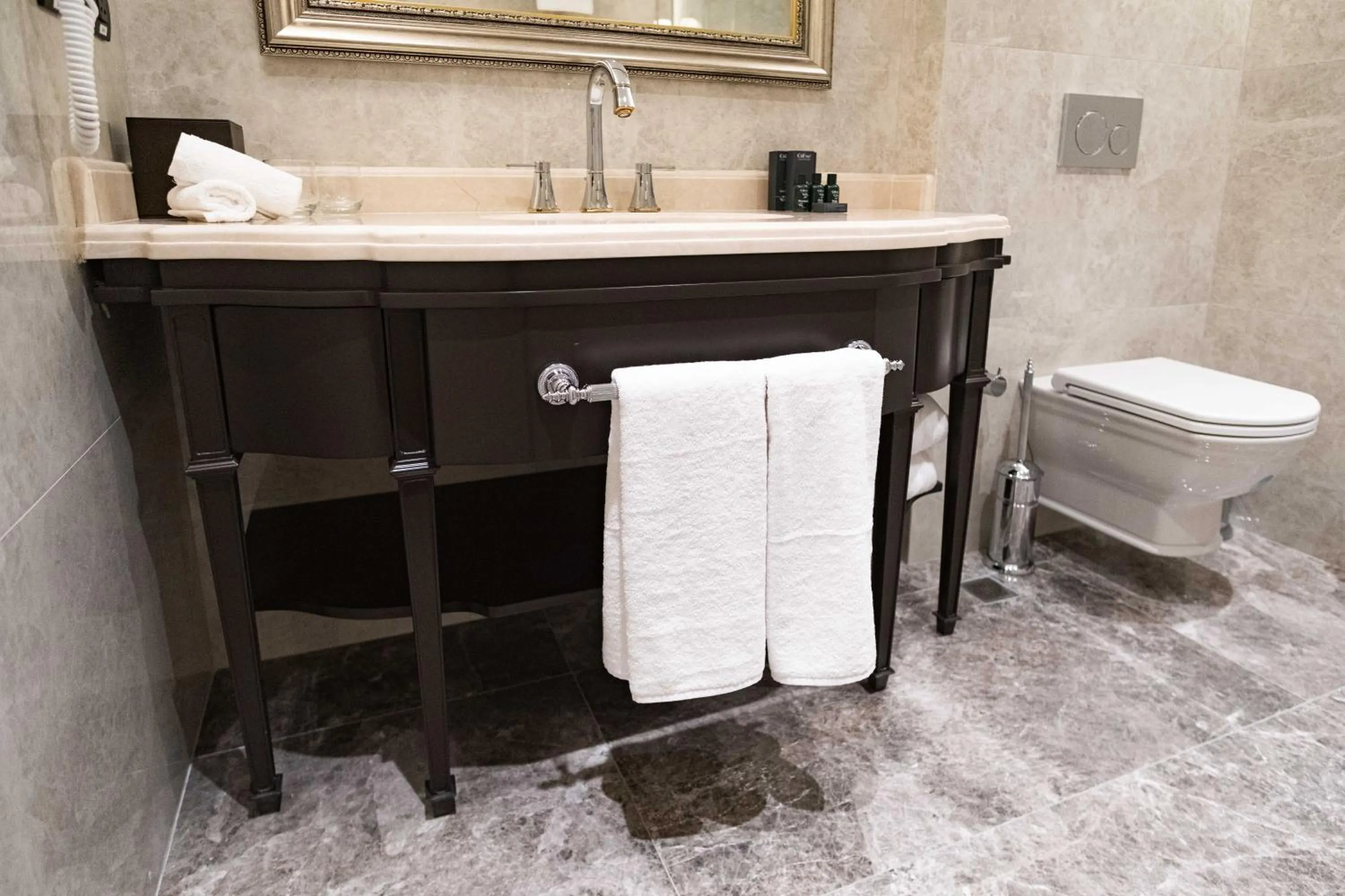 Toilet in Dekalb Hotel