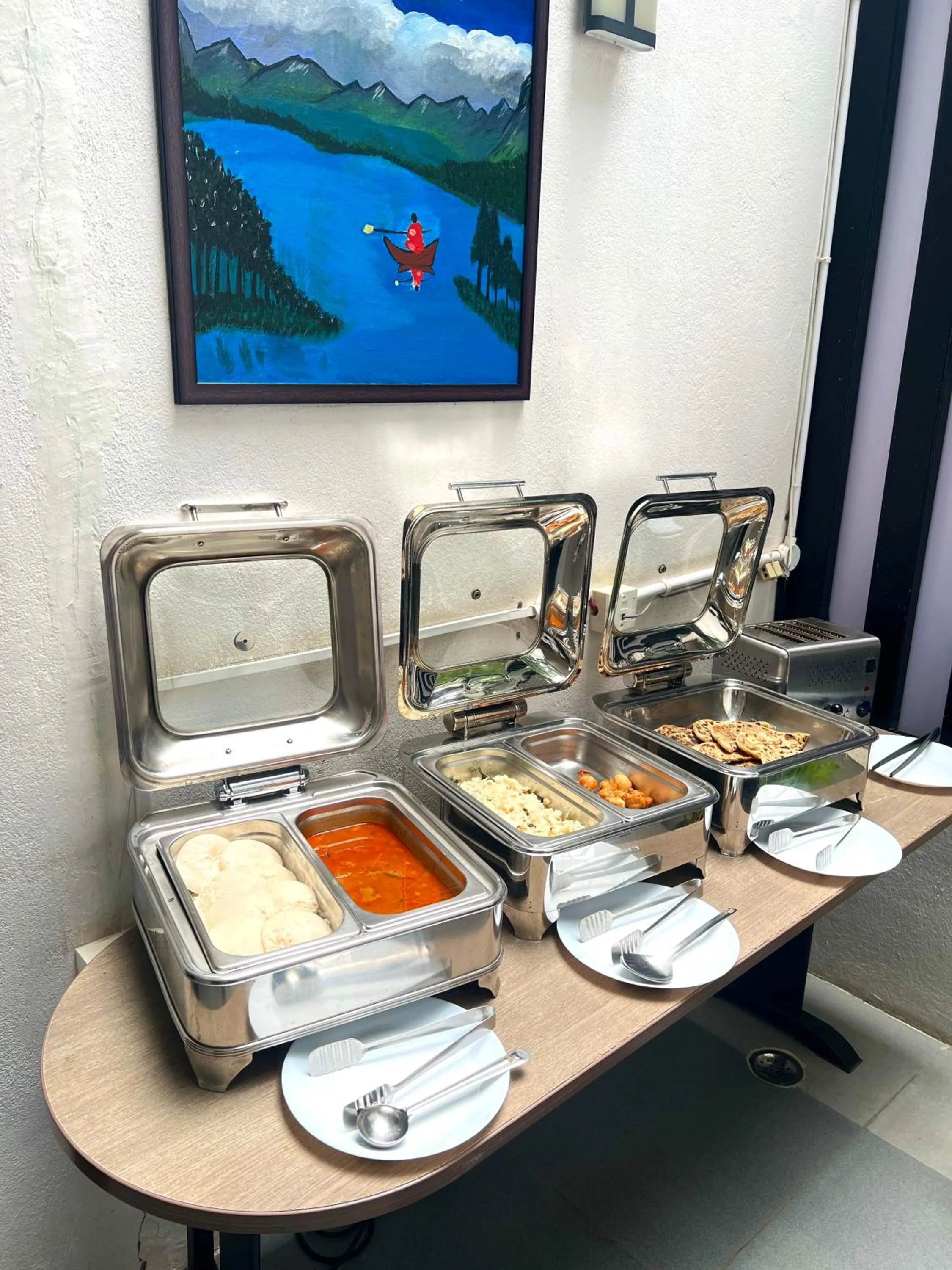 Breakfast in Athulya Residence Suite Rooms