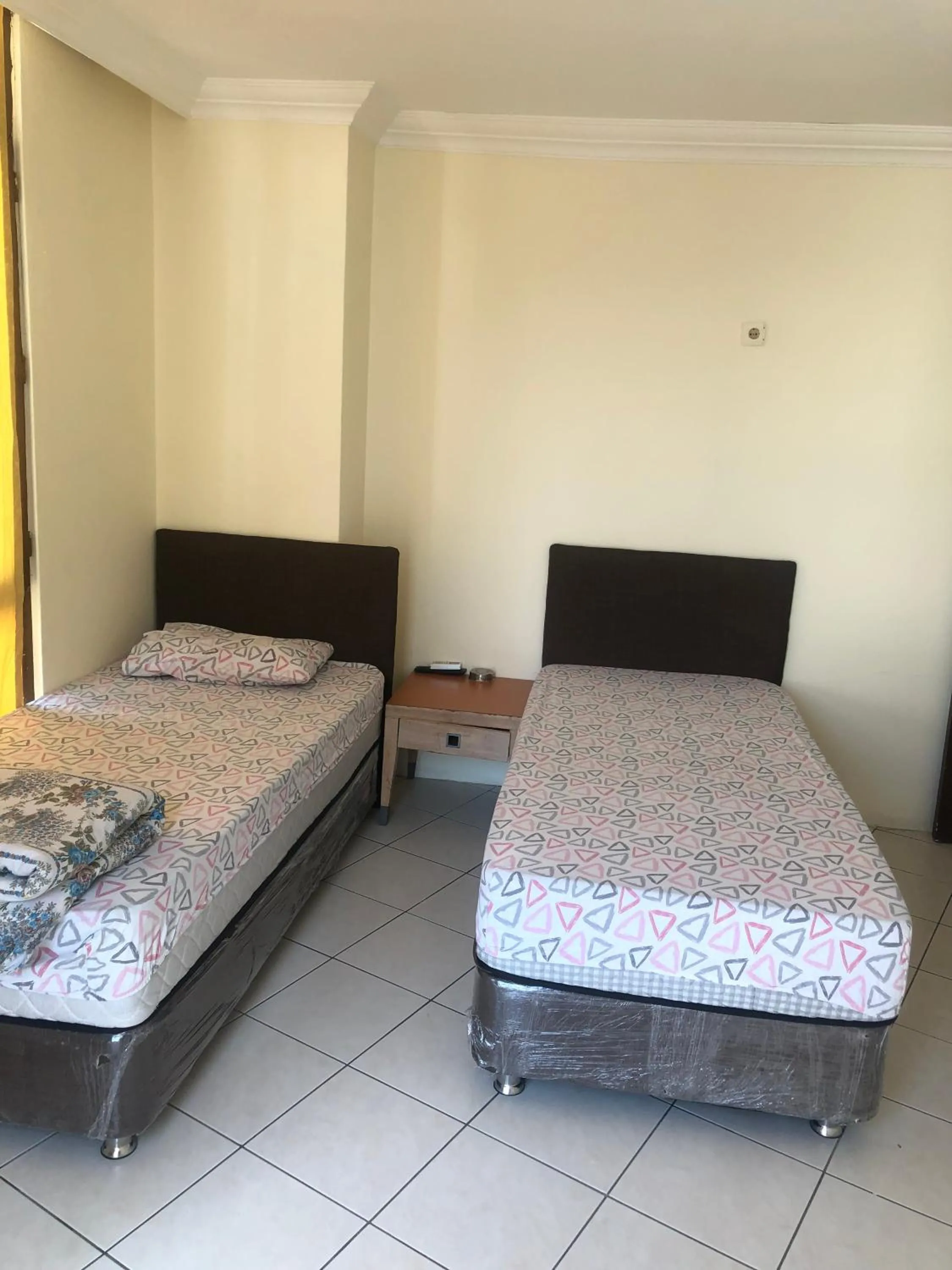 Photo of the whole room, Bed in DİZLEK PANSİYON