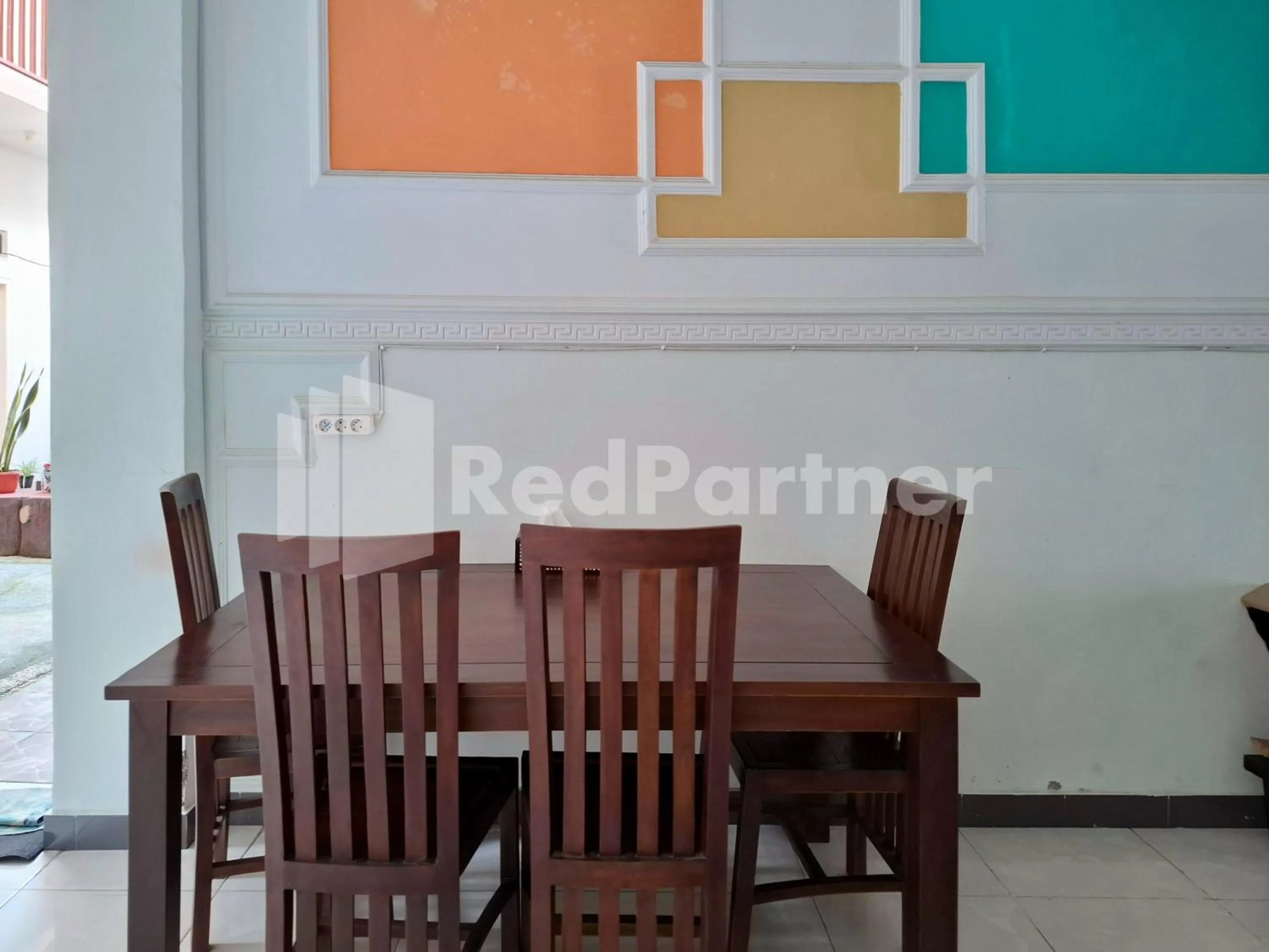 Seating area in Assalaam Homestay Syariah RedPartner