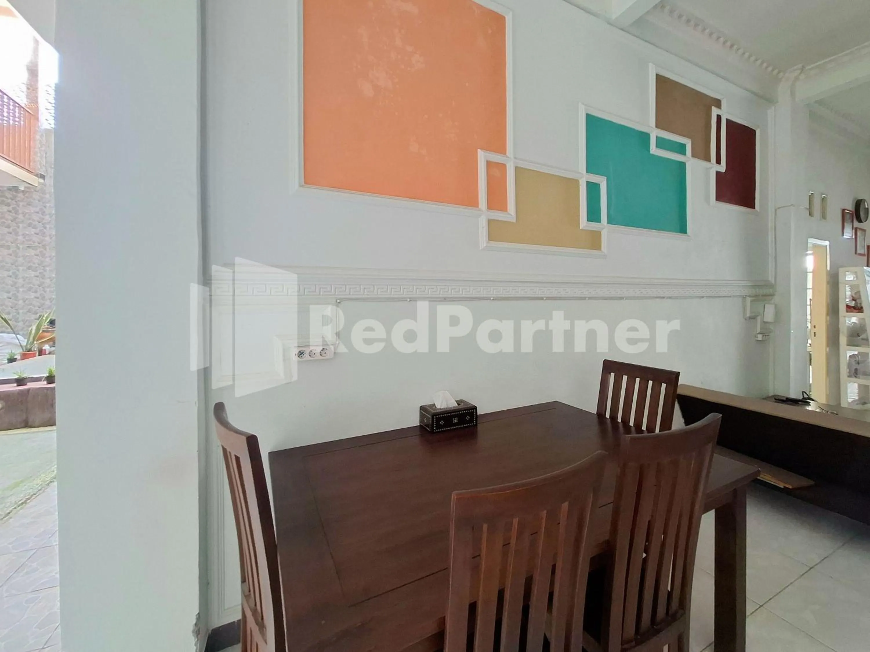 Seating area in Assalaam Homestay Syariah RedPartner