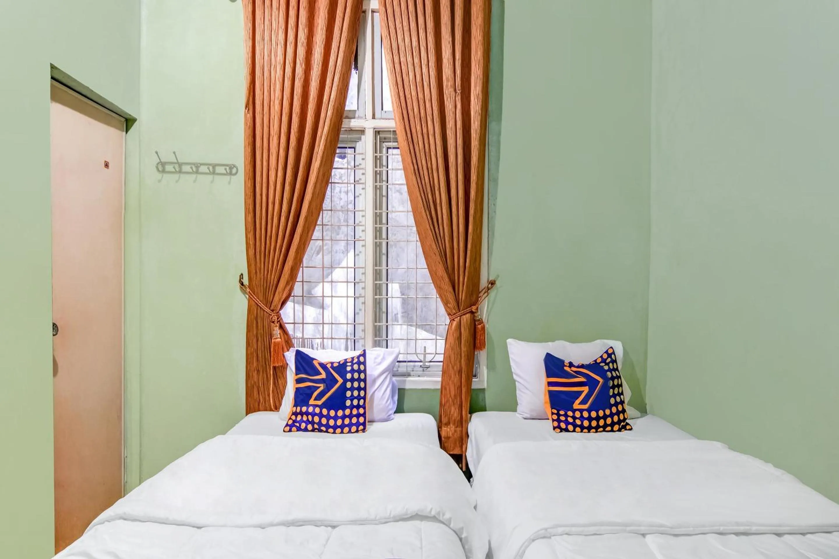 Bedroom, Bed in Hotel O Nayla Homestay Syariah Near Koro Koro Panam, Karaoke, Pool, & Cafe