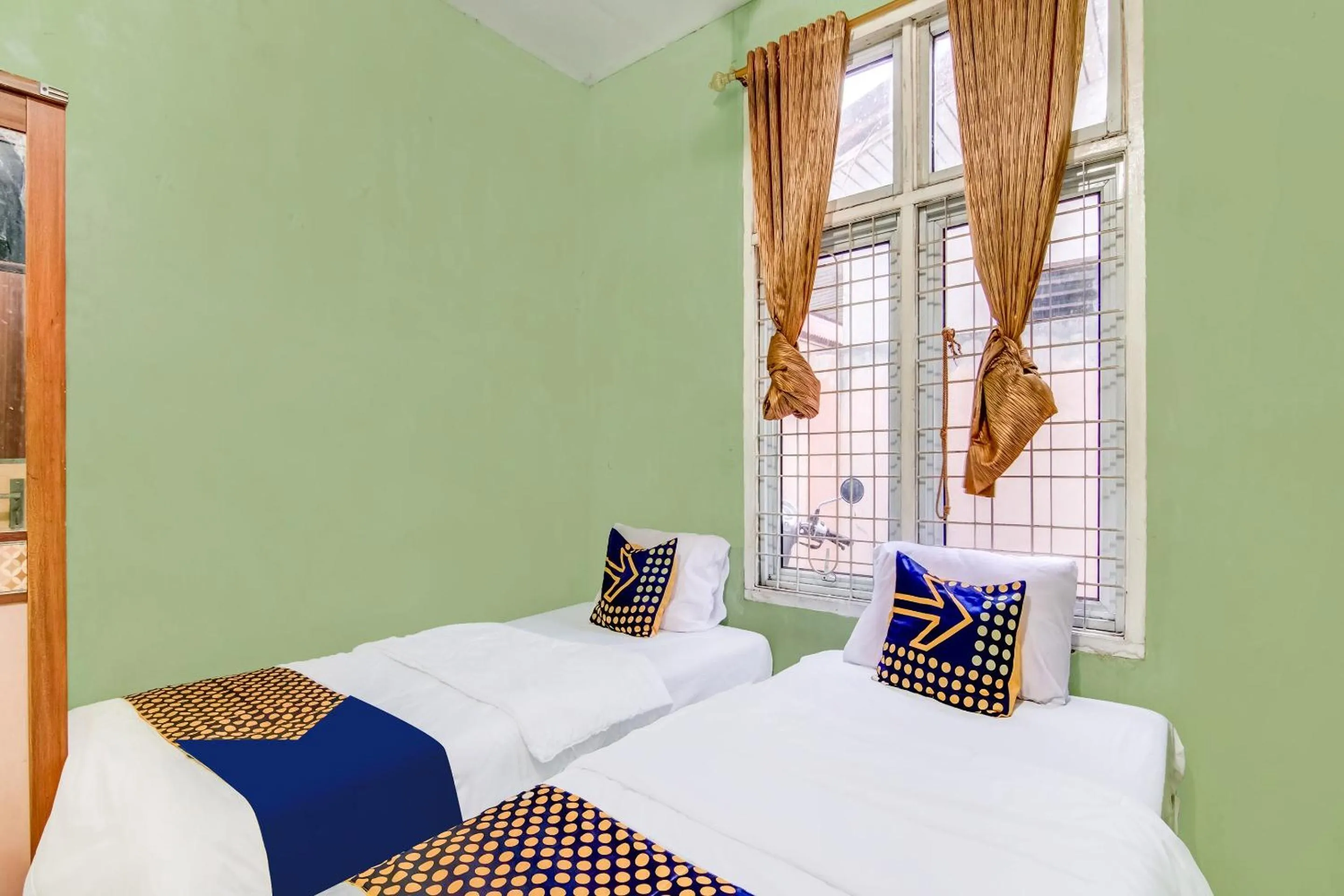 Bedroom, Bed in Hotel O Nayla Homestay Syariah Near Koro Koro Panam, Karaoke, Pool, & Cafe