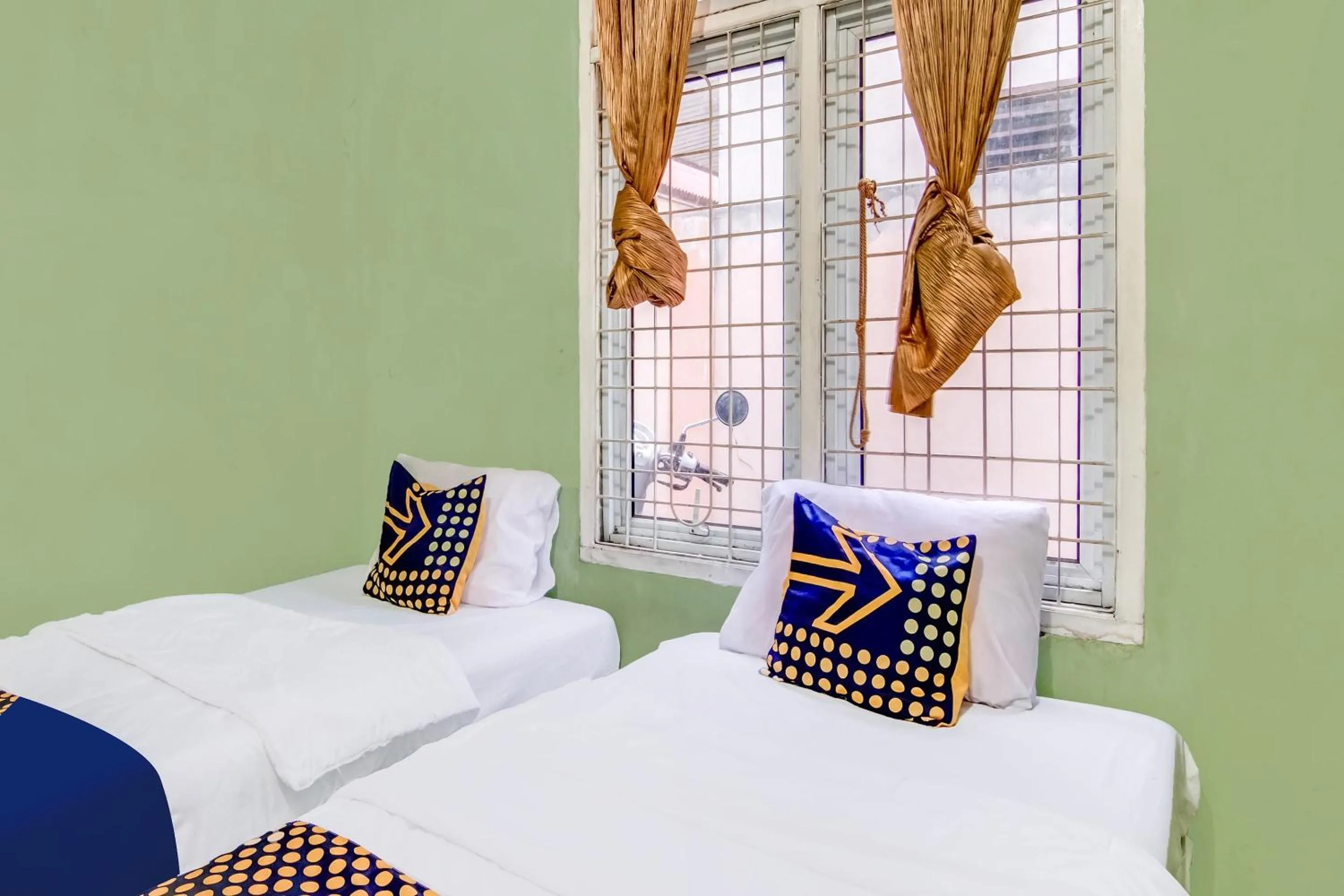 Bedroom, Bed in Hotel O Nayla Homestay Syariah Near Koro Koro Panam, Karaoke, Pool, & Cafe