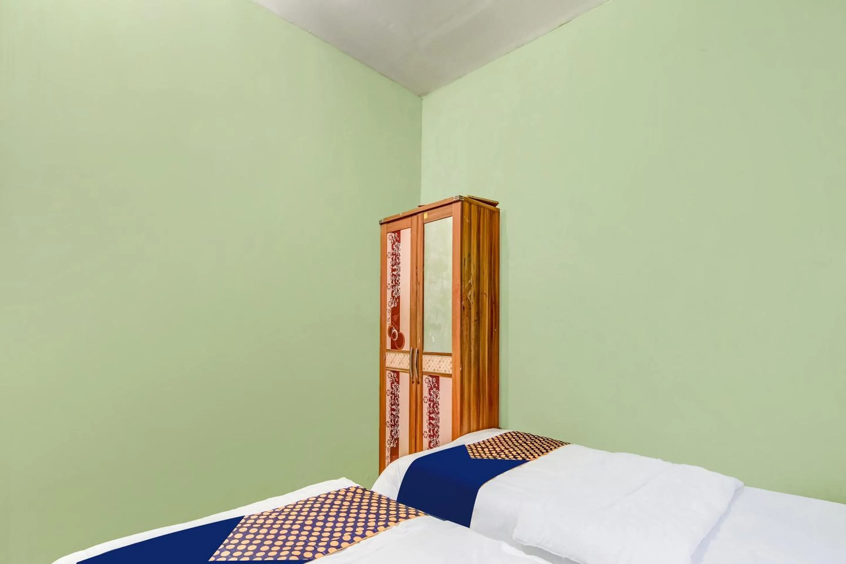 Bedroom, Bed in Hotel O Nayla Homestay Syariah Near Koro Koro Panam, Karaoke, Pool, & Cafe