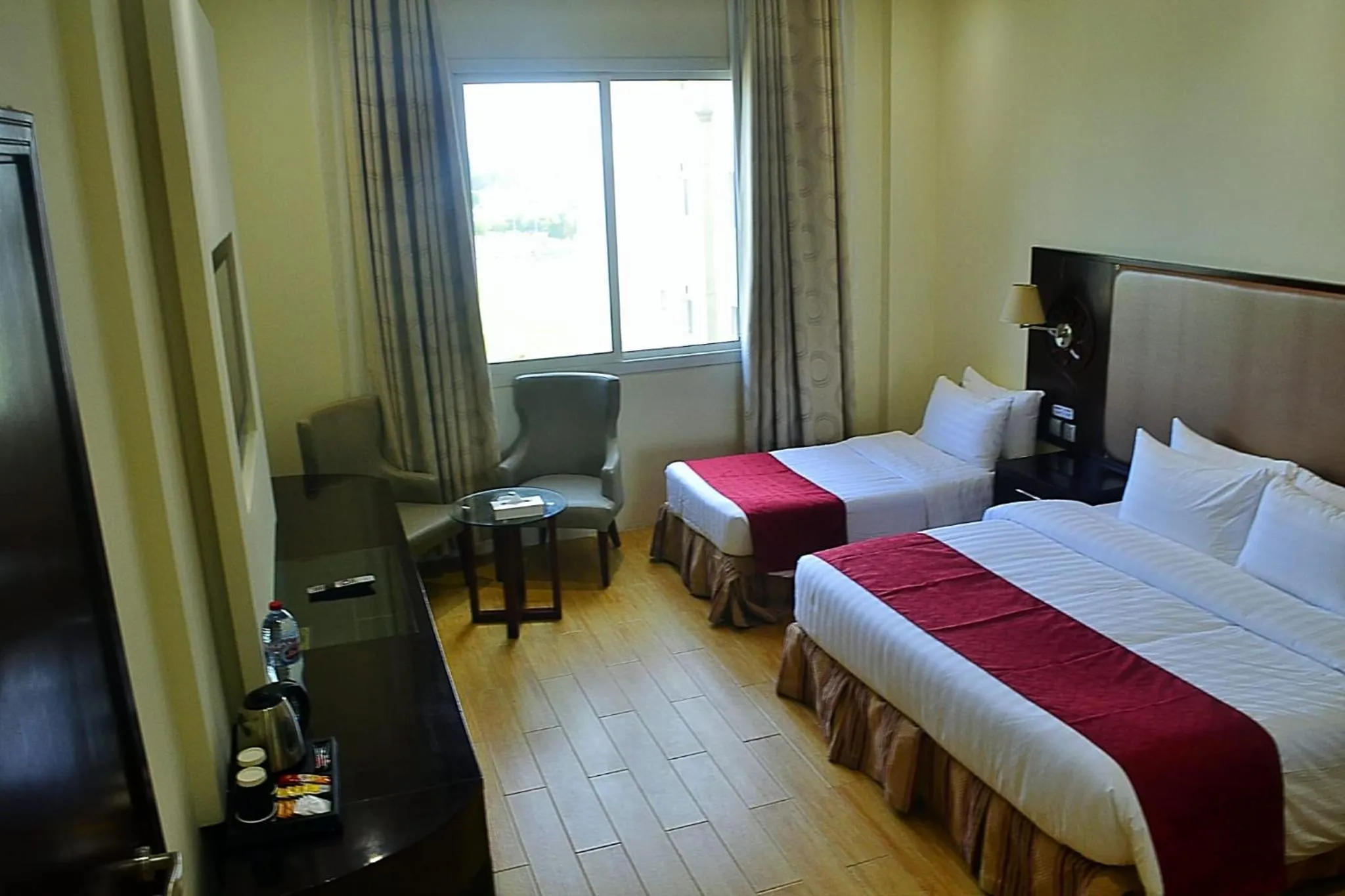 Bed in Palm Inn Hotel Doha