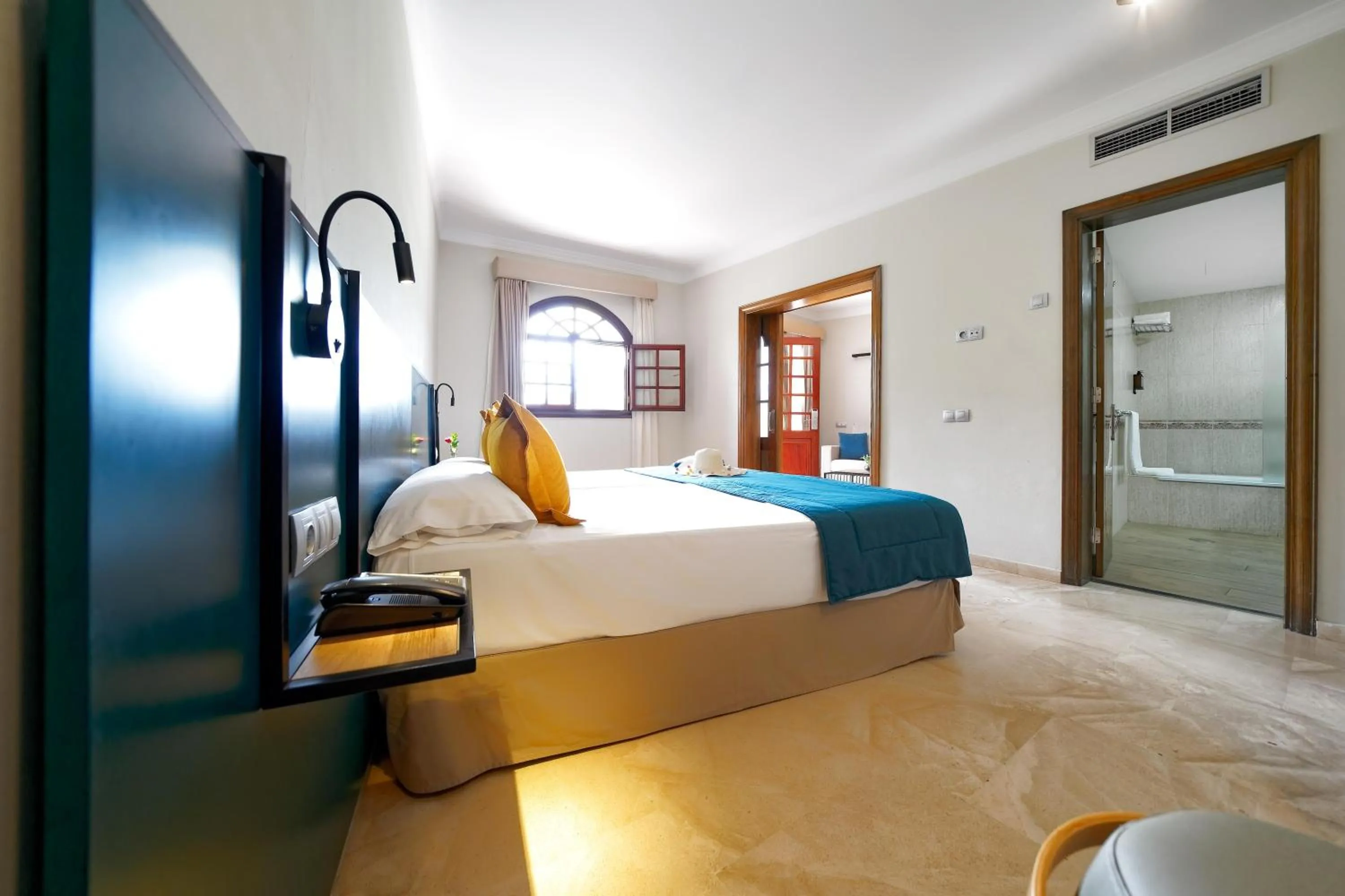 Photo of the whole room, Bed in Suites & Villas by Dunas