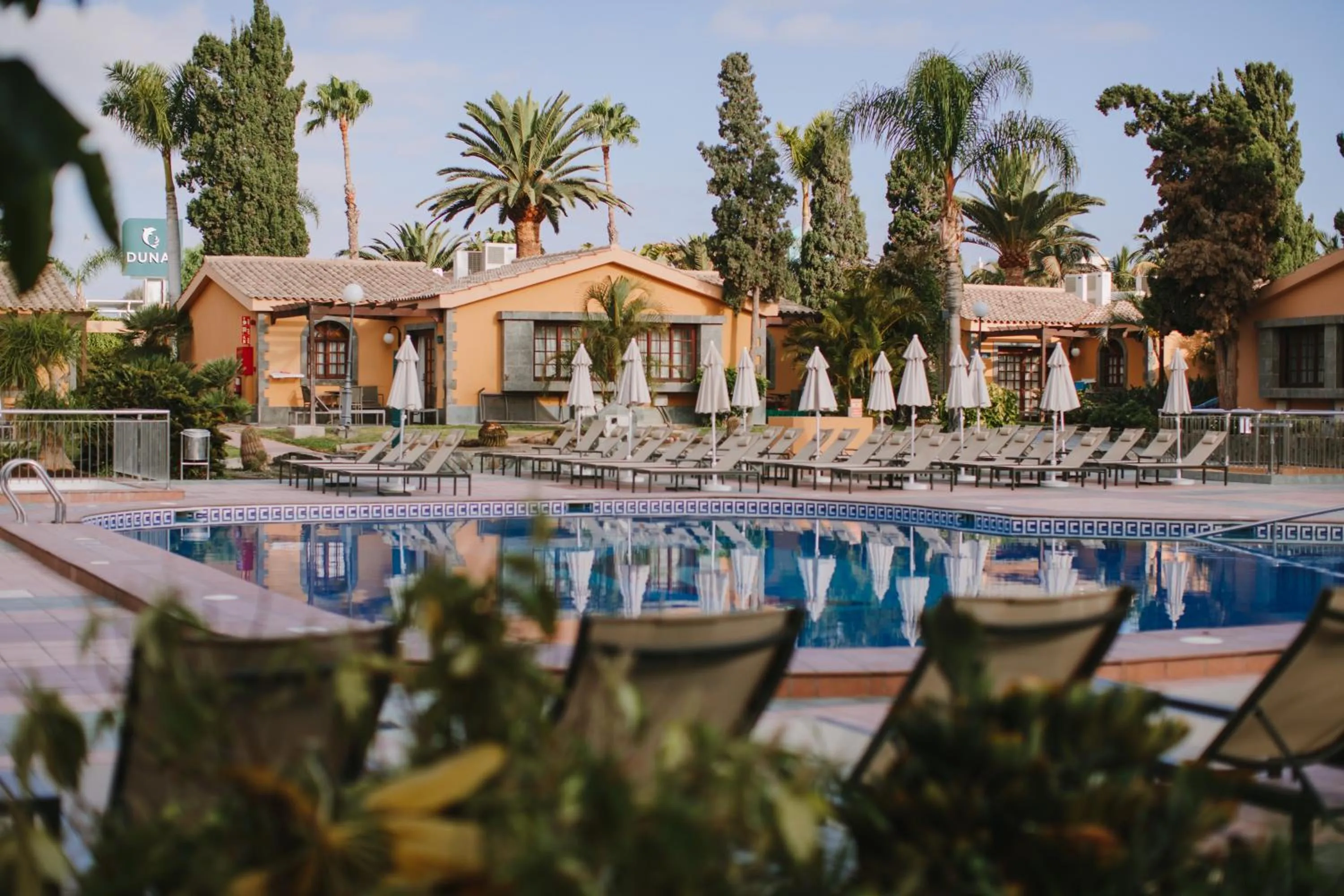 Swimming pool in Suites & Villas by Dunas