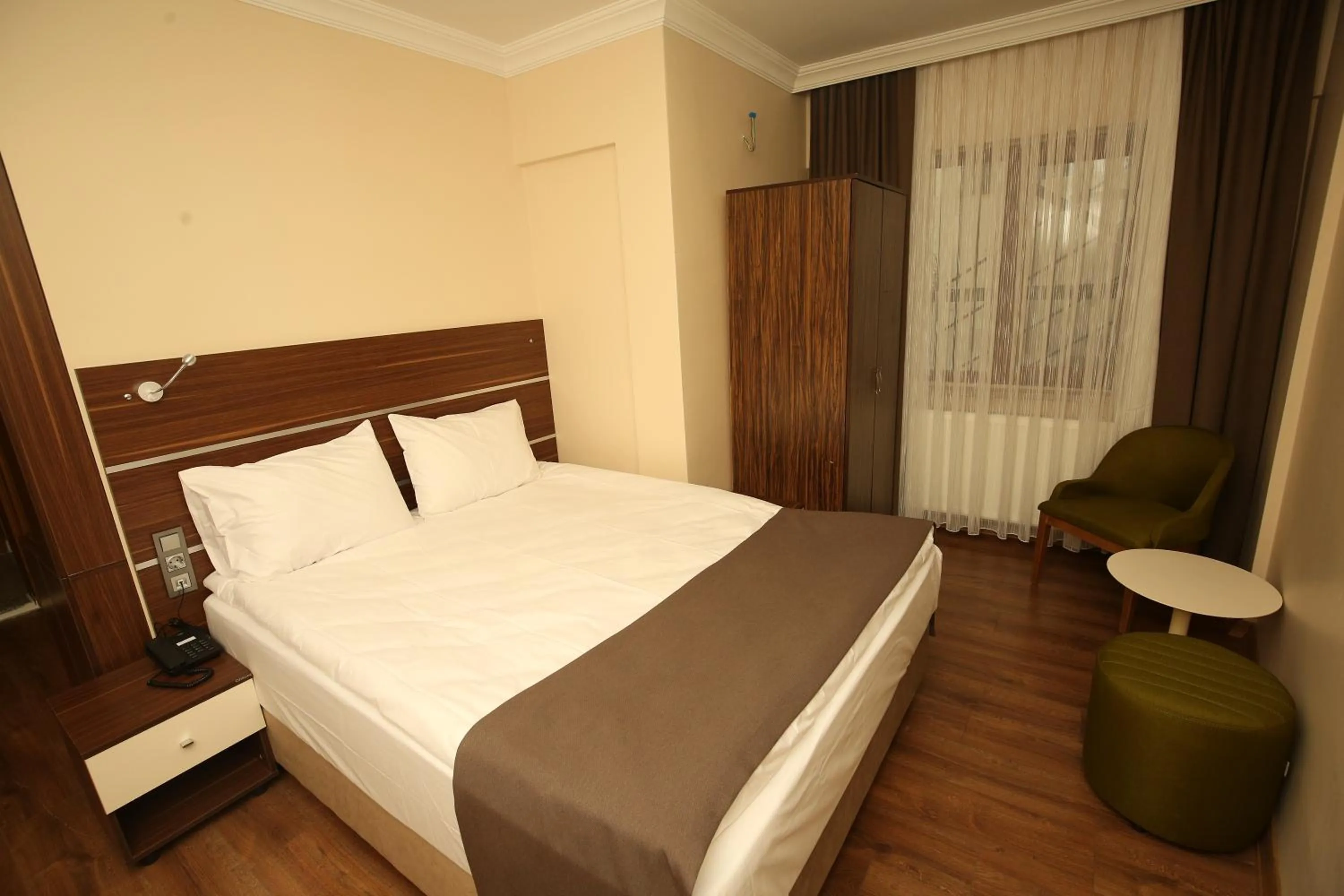 Bed in BEYAZ İNCİ OTEL