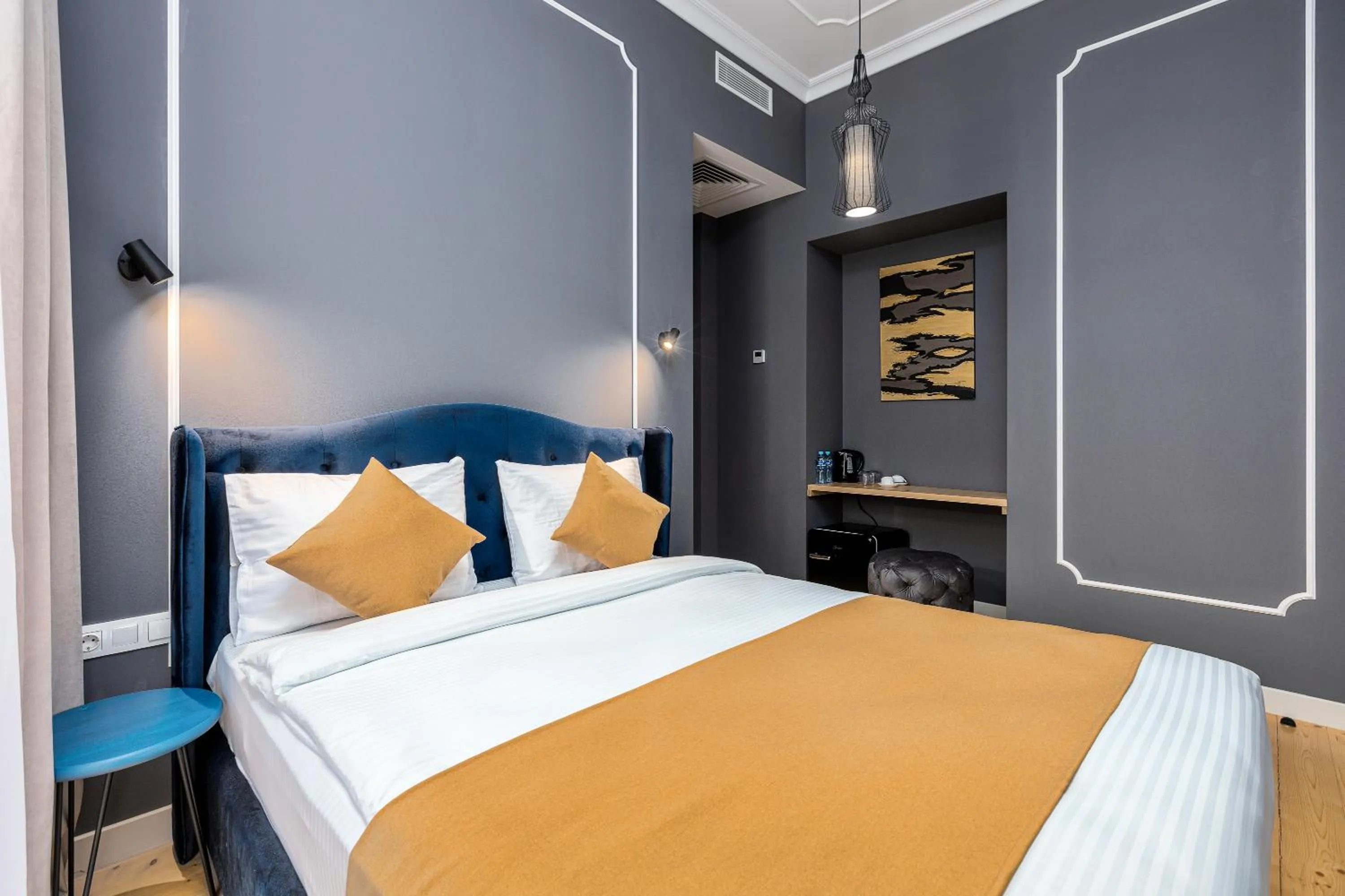 Bed in Blue Balcony Hotel