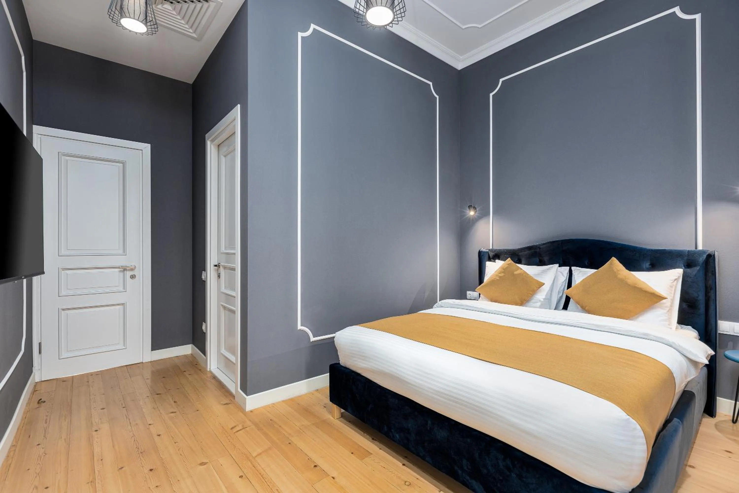 Bed in Blue Balcony Hotel