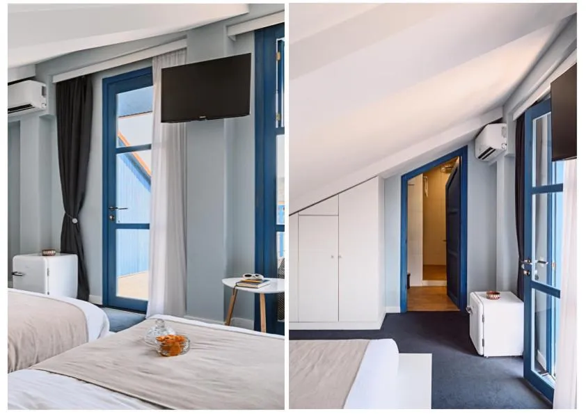 Seating area, Bed in Blue Balcony Hotel