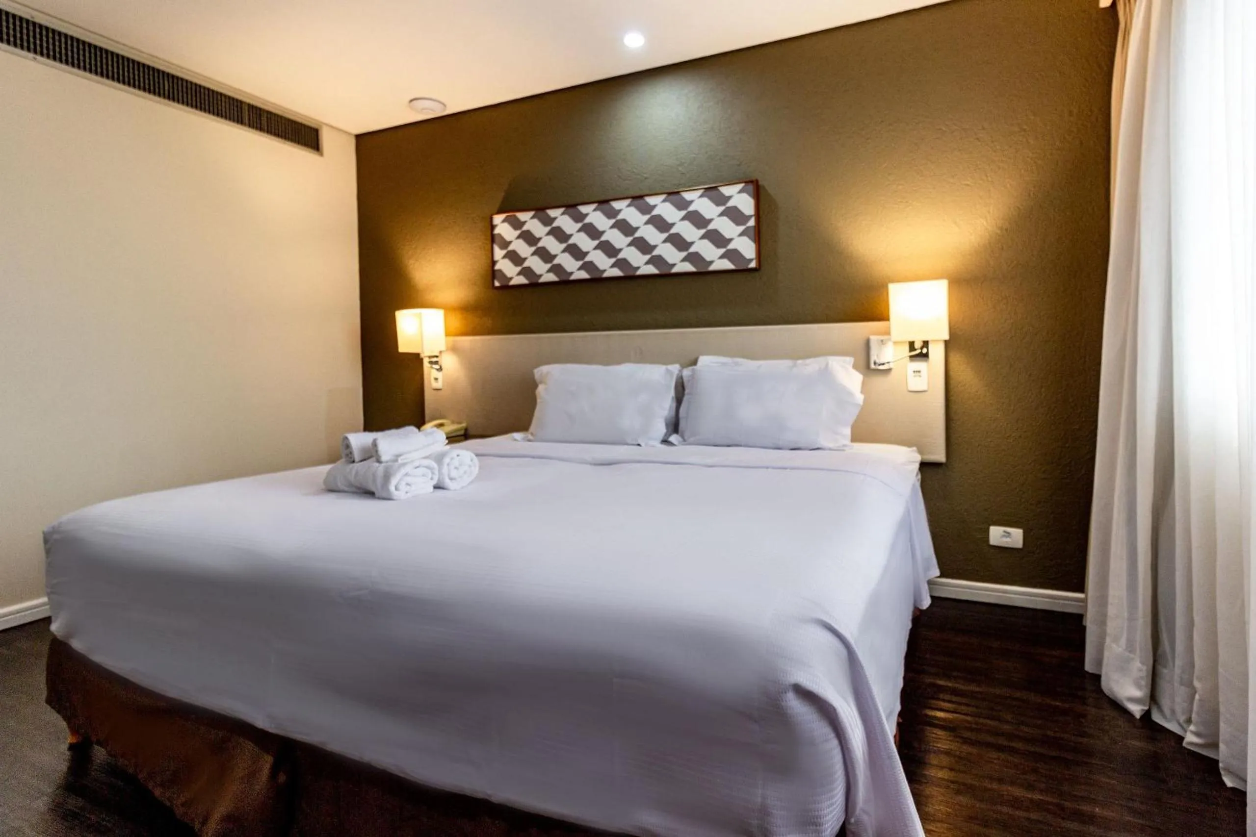 Bedroom, Bed in Xtay São Paulo Berrini - Apartamentos completos a 7min do metrô Berrini