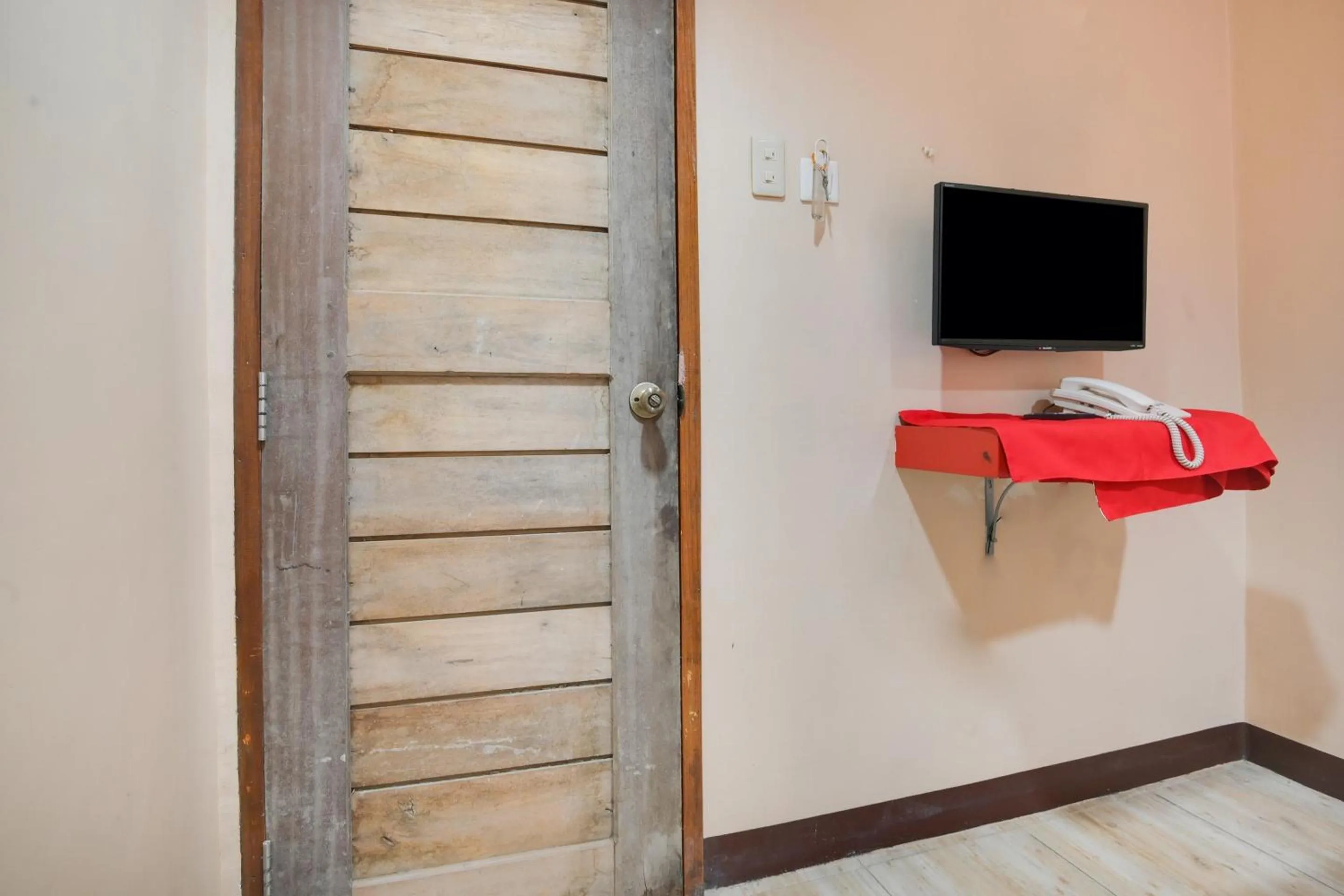 Bedroom in OYO 912 Fb Suites