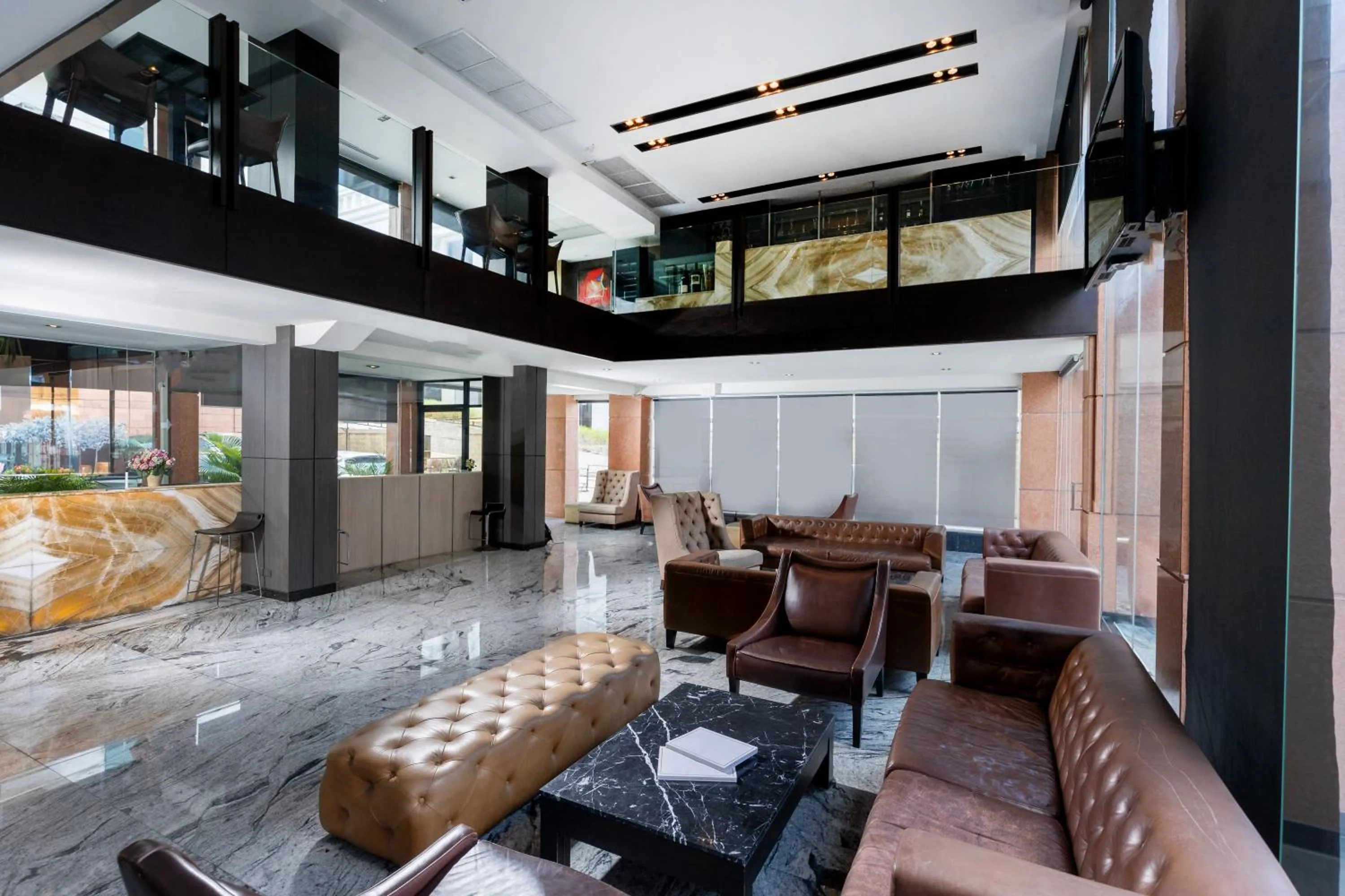 Communal lounge/ TV room in Sukhothai Hotel and Residence Ratchada