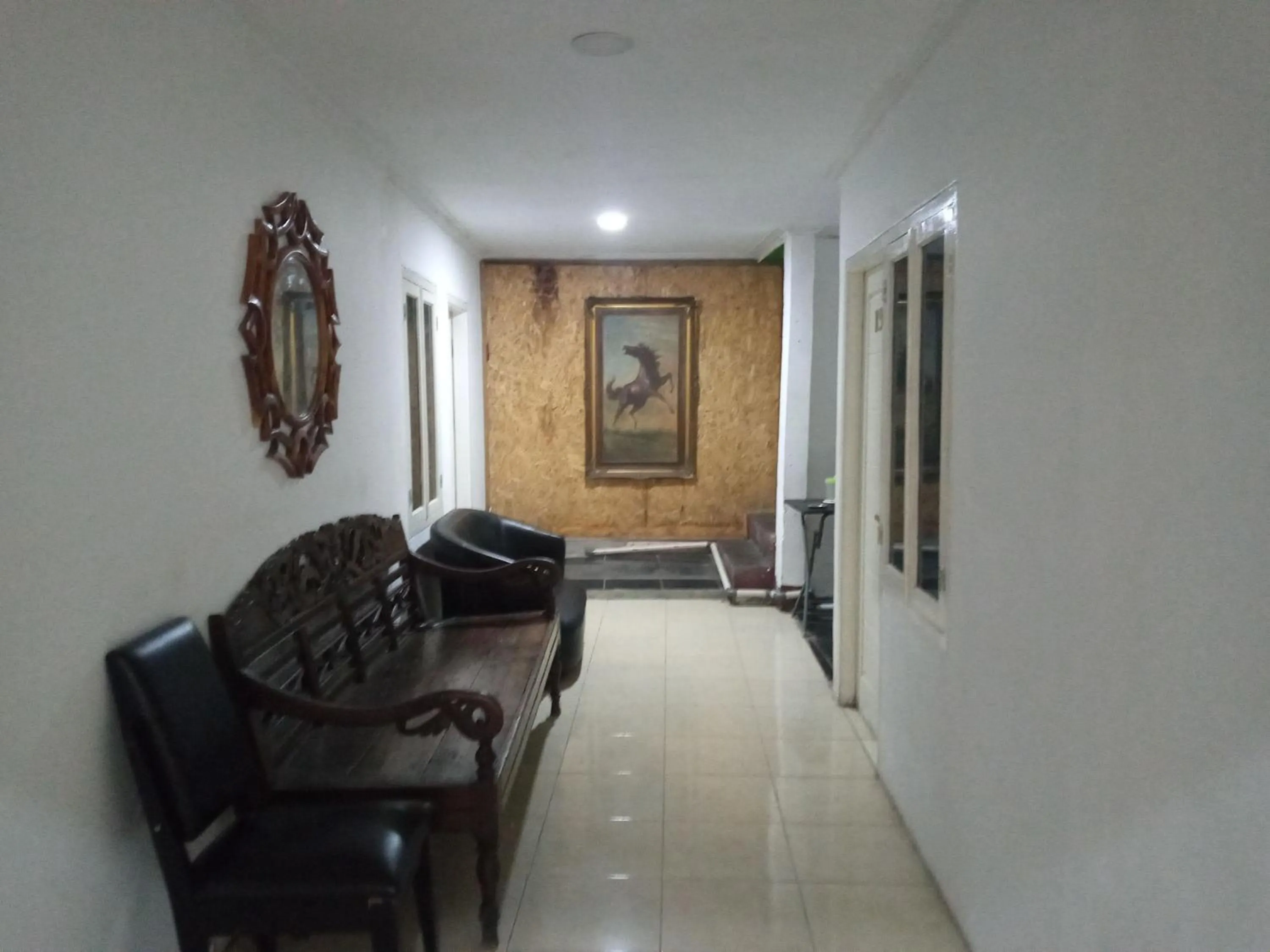 Living room in Urbanview Hotel Rio Life House Cianjur by RedDoorz