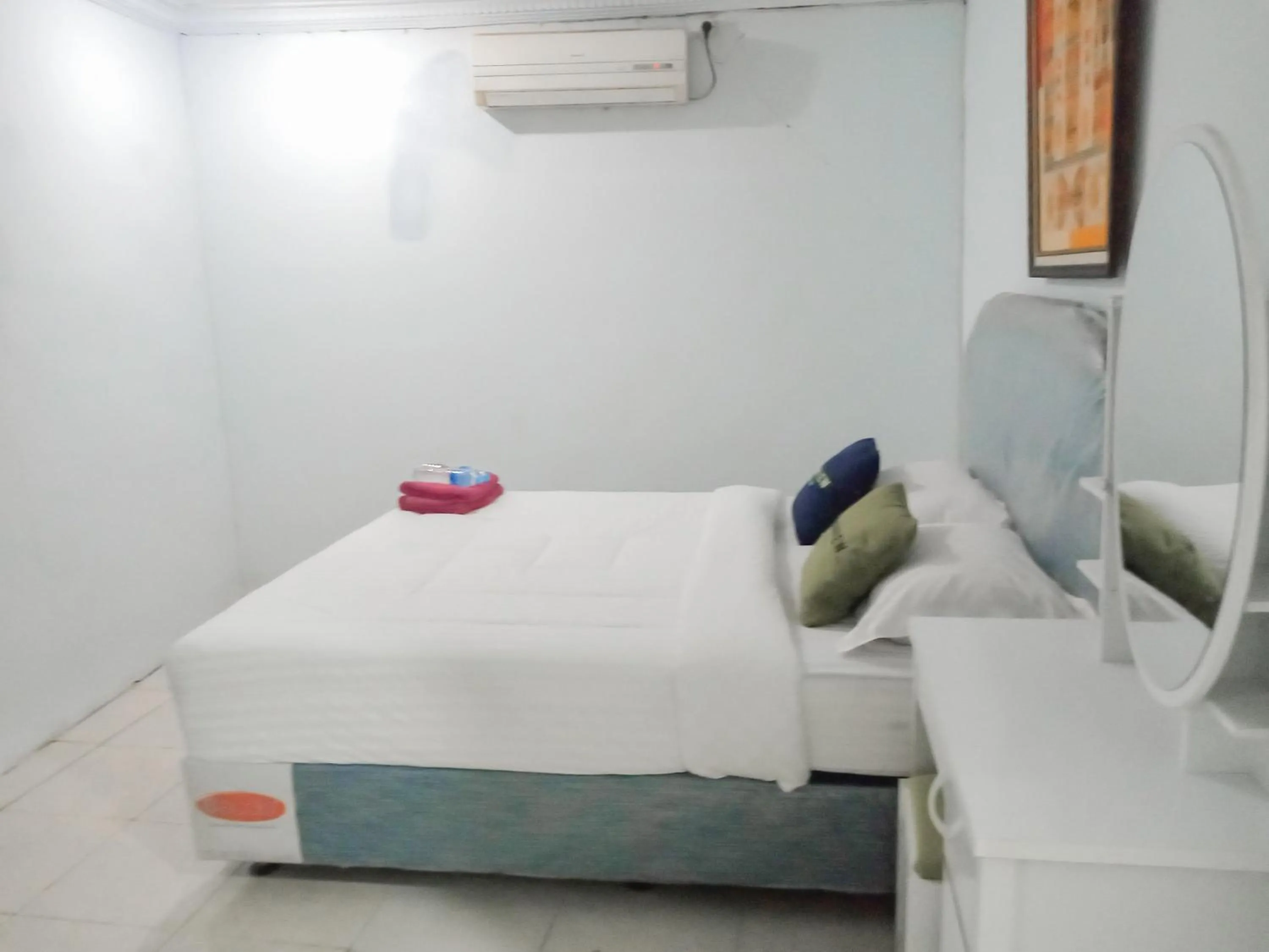 Bedroom, Bed in Urbanview Hotel Rio Life House Cianjur by RedDoorz
