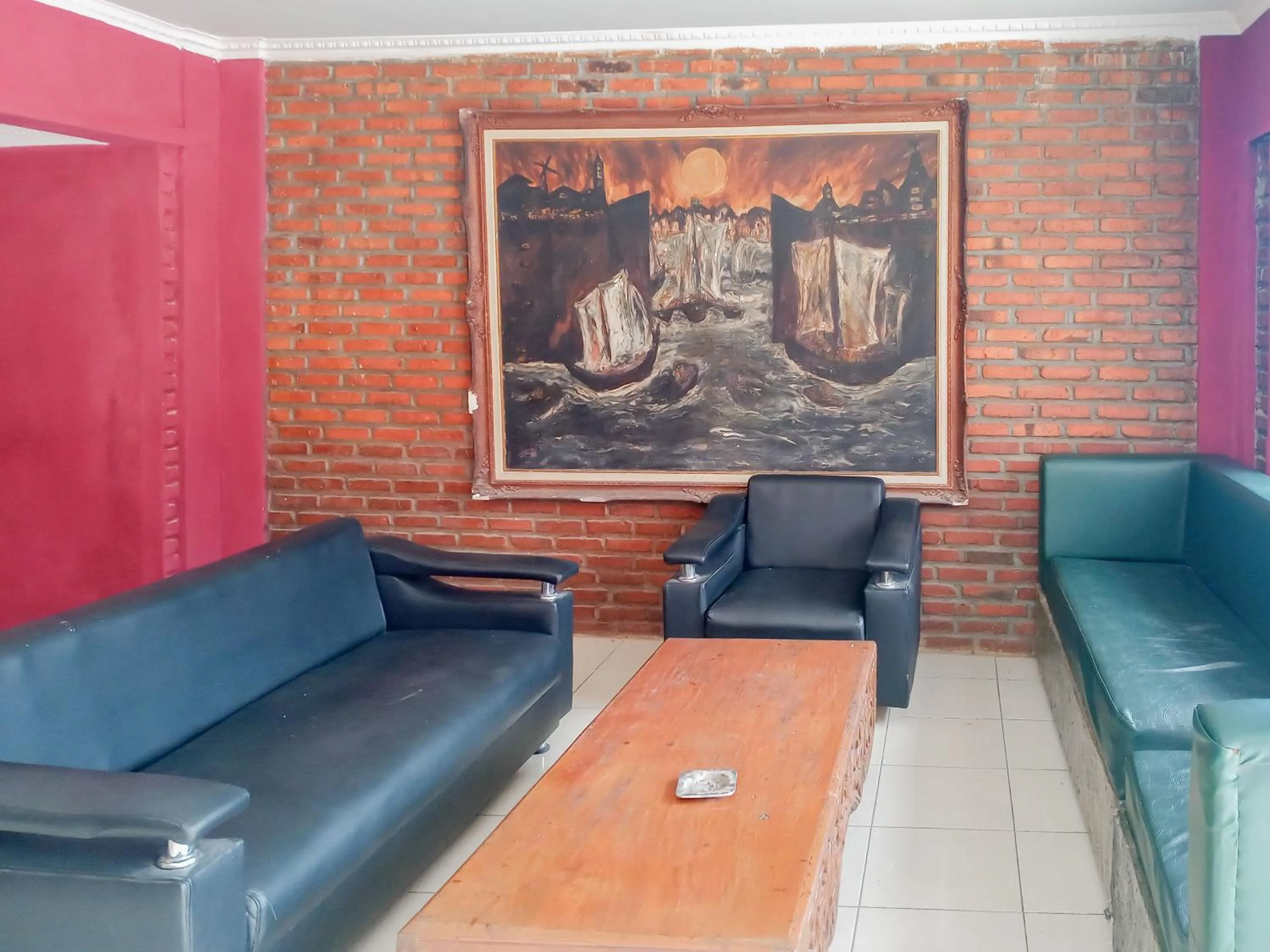 Living room in Urbanview Hotel Rio Life House Cianjur by RedDoorz