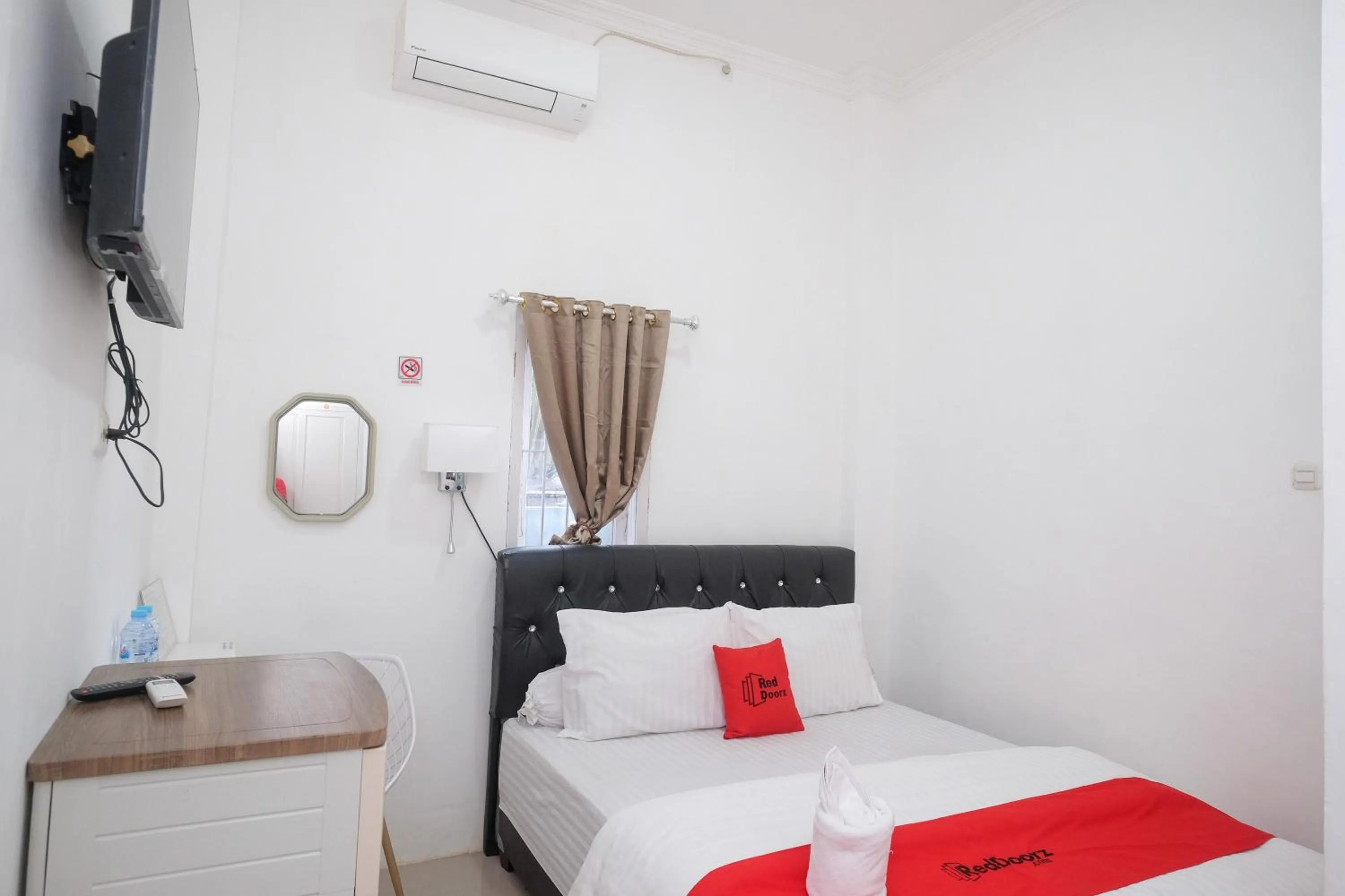 Bed in RedDoorz Plus At Lovina Inn Tonrangeng River Side