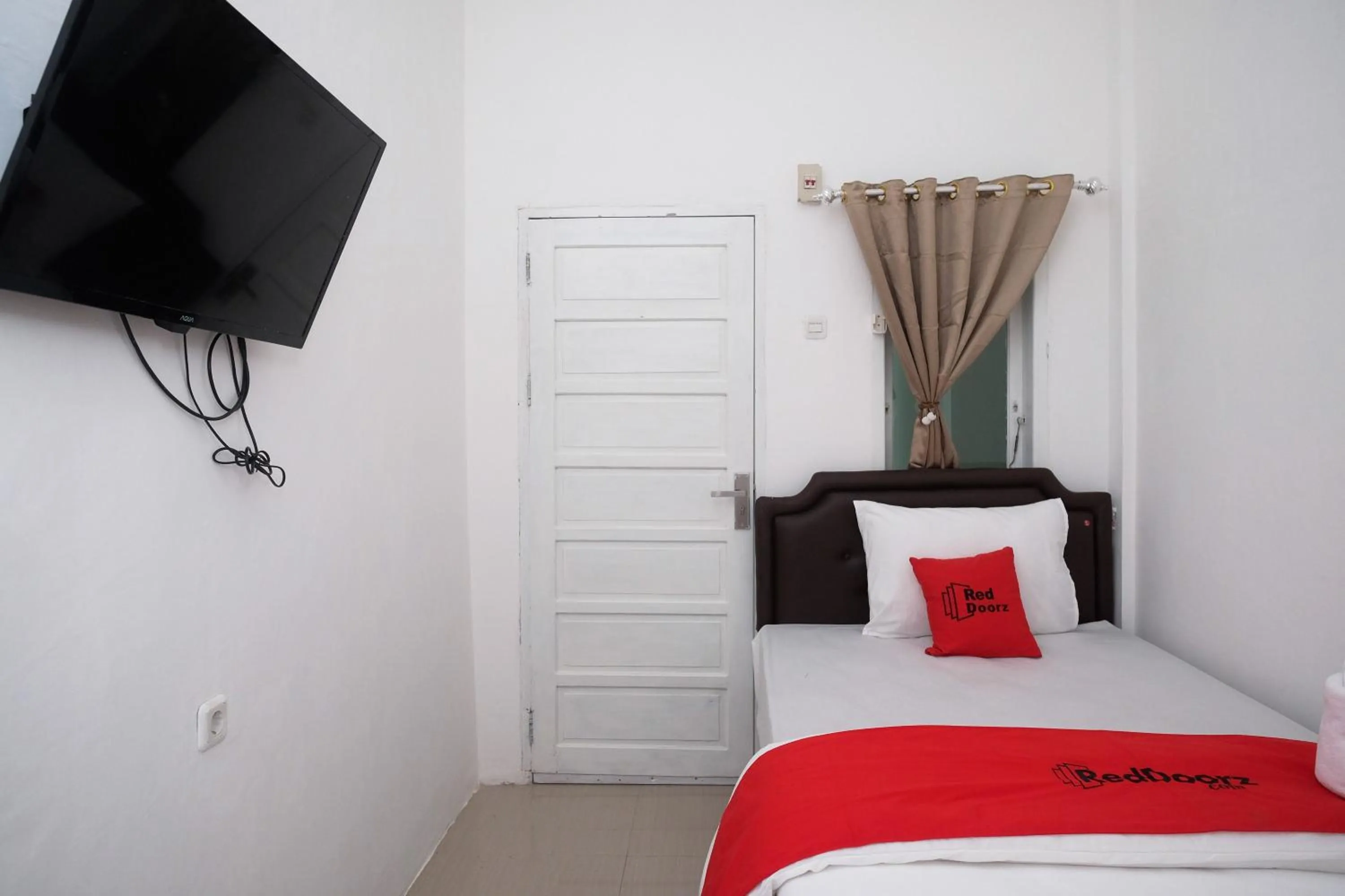 Bed in RedDoorz Plus At Lovina Inn Tonrangeng River Side