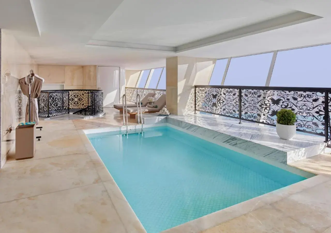 Pool view in Raffles Doha Pool view in Raffles Doha