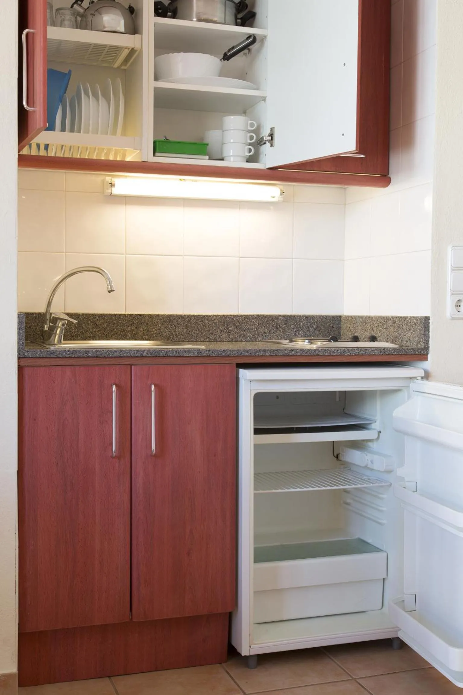 Kitchen or kitchenette in Apartamentos Casa Maria