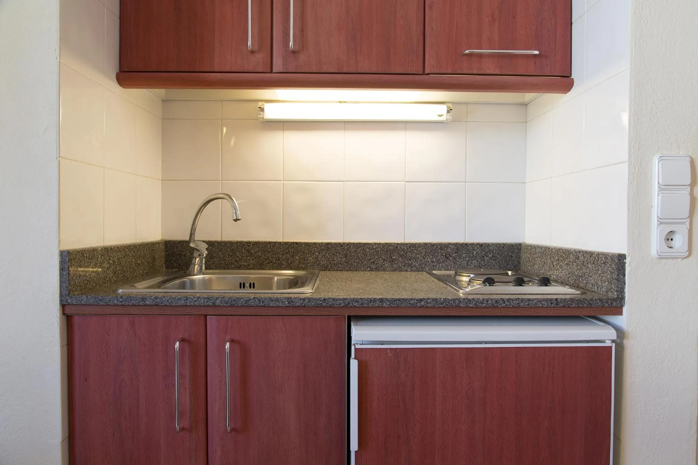 Kitchen or kitchenette in Apartamentos Casa Maria