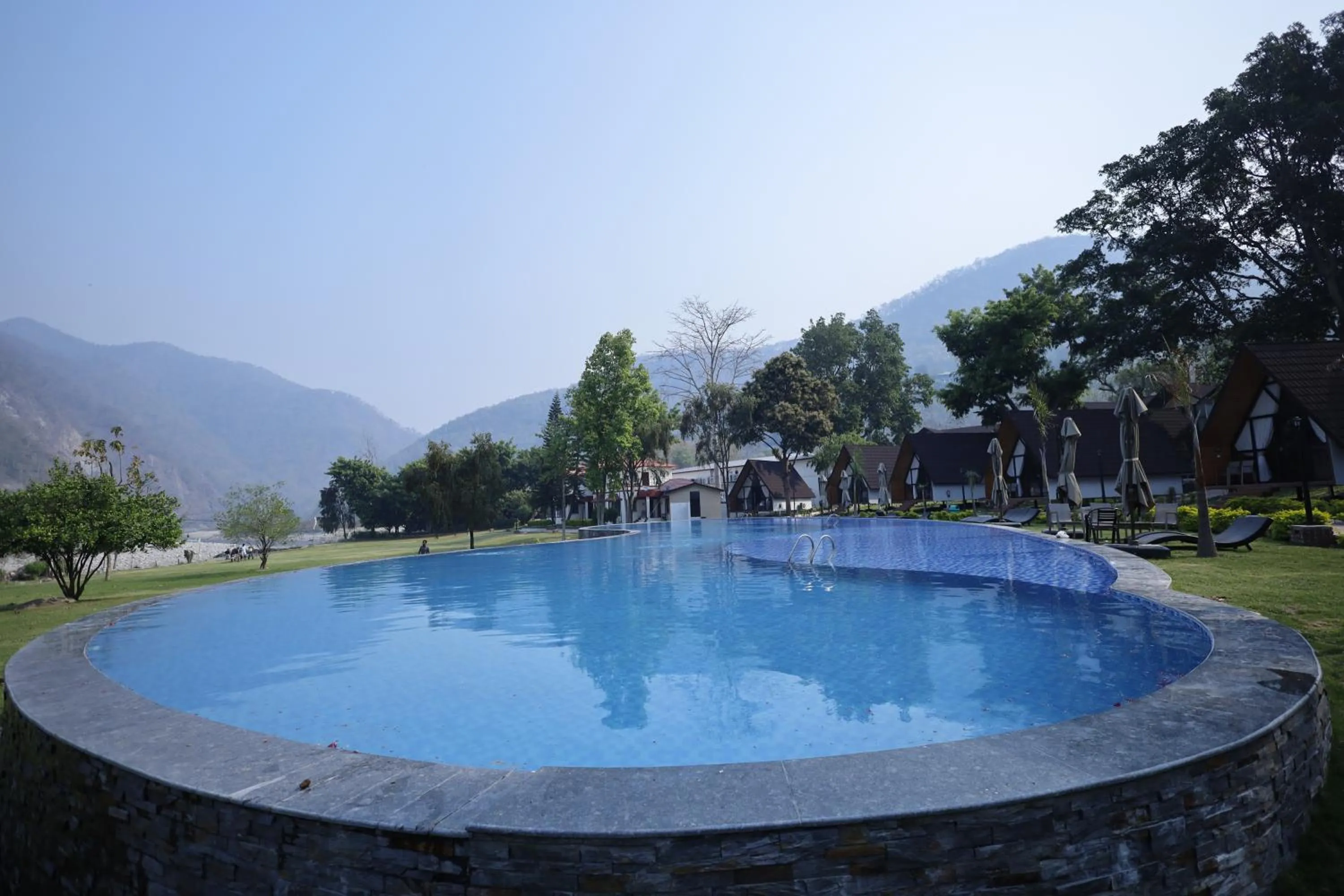 Swimming pool in WelcomHeritage Tarangi Ramganga Resort