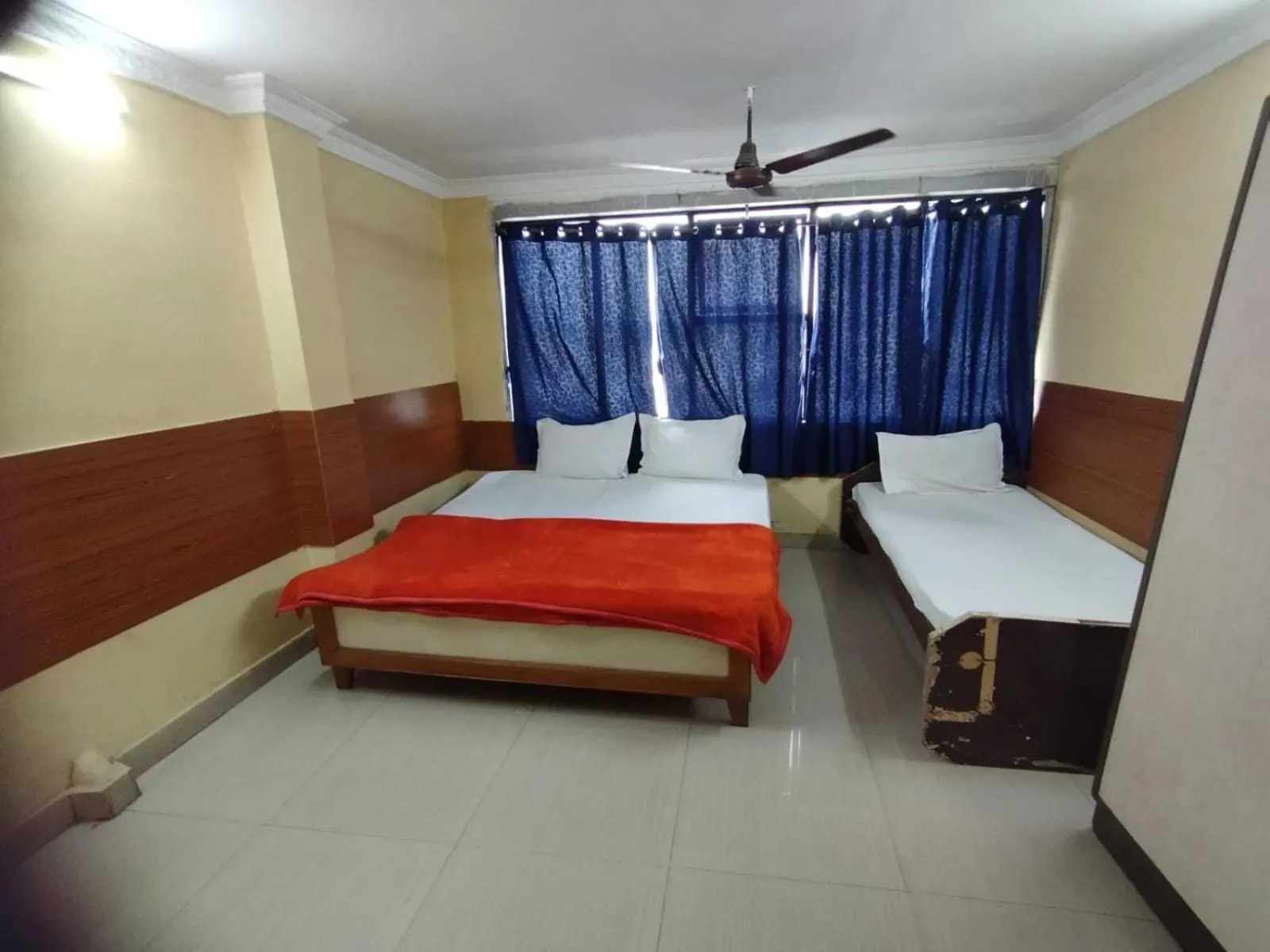 Bedroom in SPOT ON Hotel Akshaya Residency Near Bbr Super Speciality Hospital