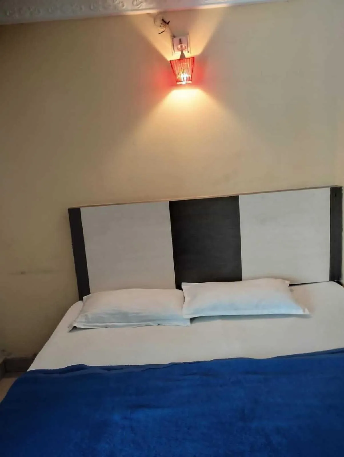 Bedroom in SPOT ON Hotel Akshaya Residency Near Bbr Super Speciality Hospital